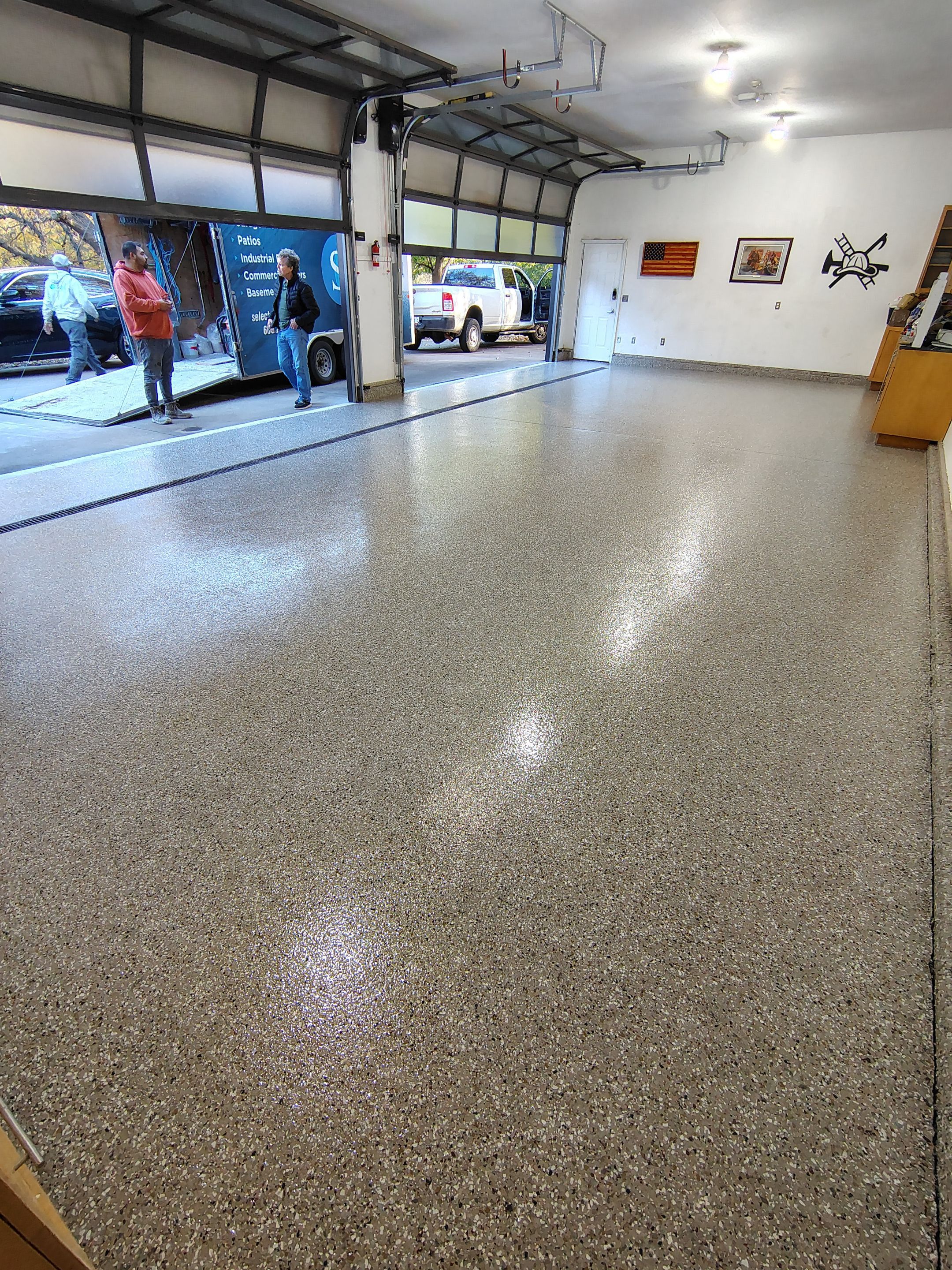 Garage Floor and Entry Step Concrete Coating in Sioux Falls by Select Painting, Coatings & Garage Cabinets