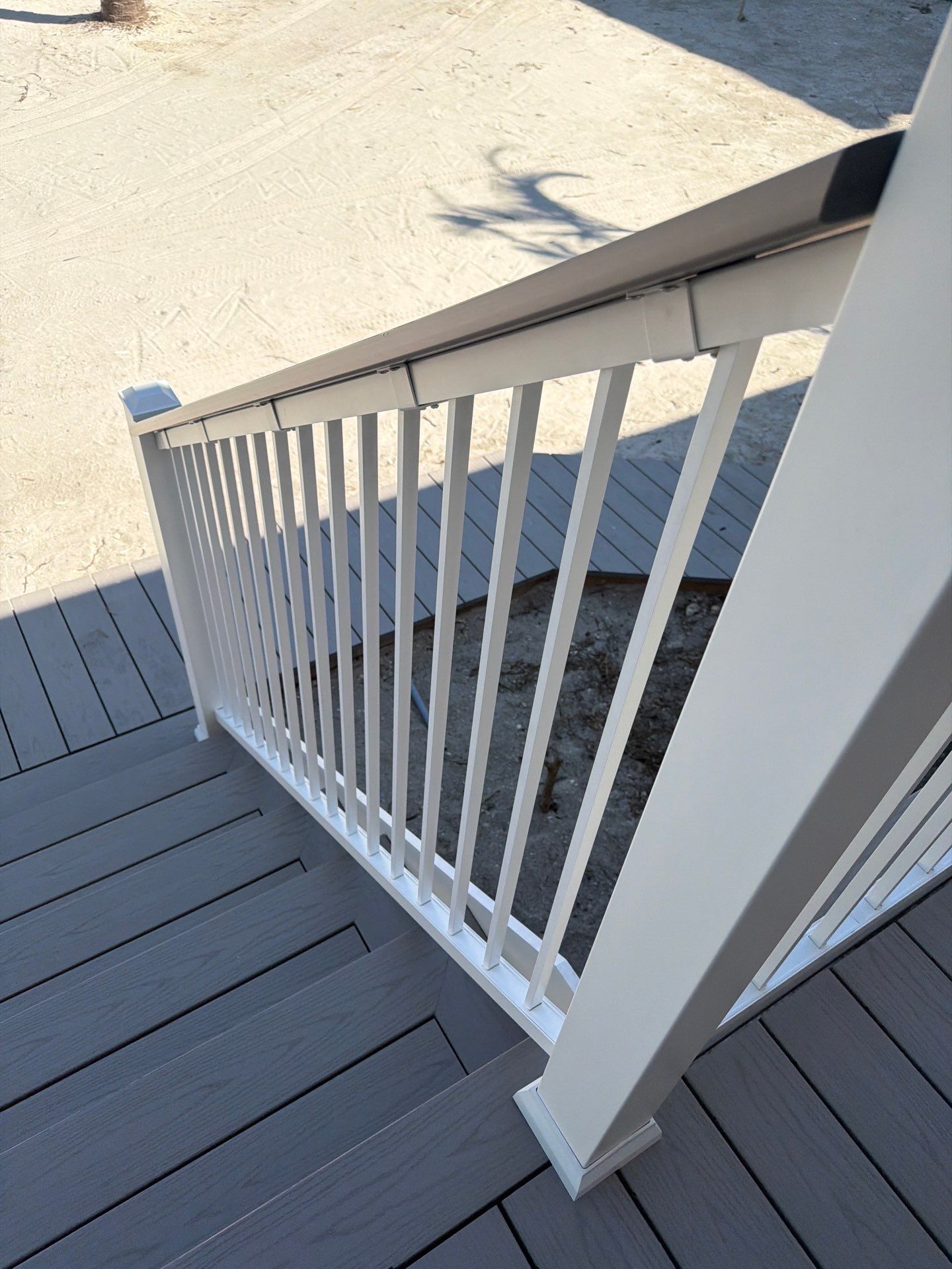 Elevated Coastal Home Renovation with Siding and Custom Decks in Englewood by Smirnov Construction Inc