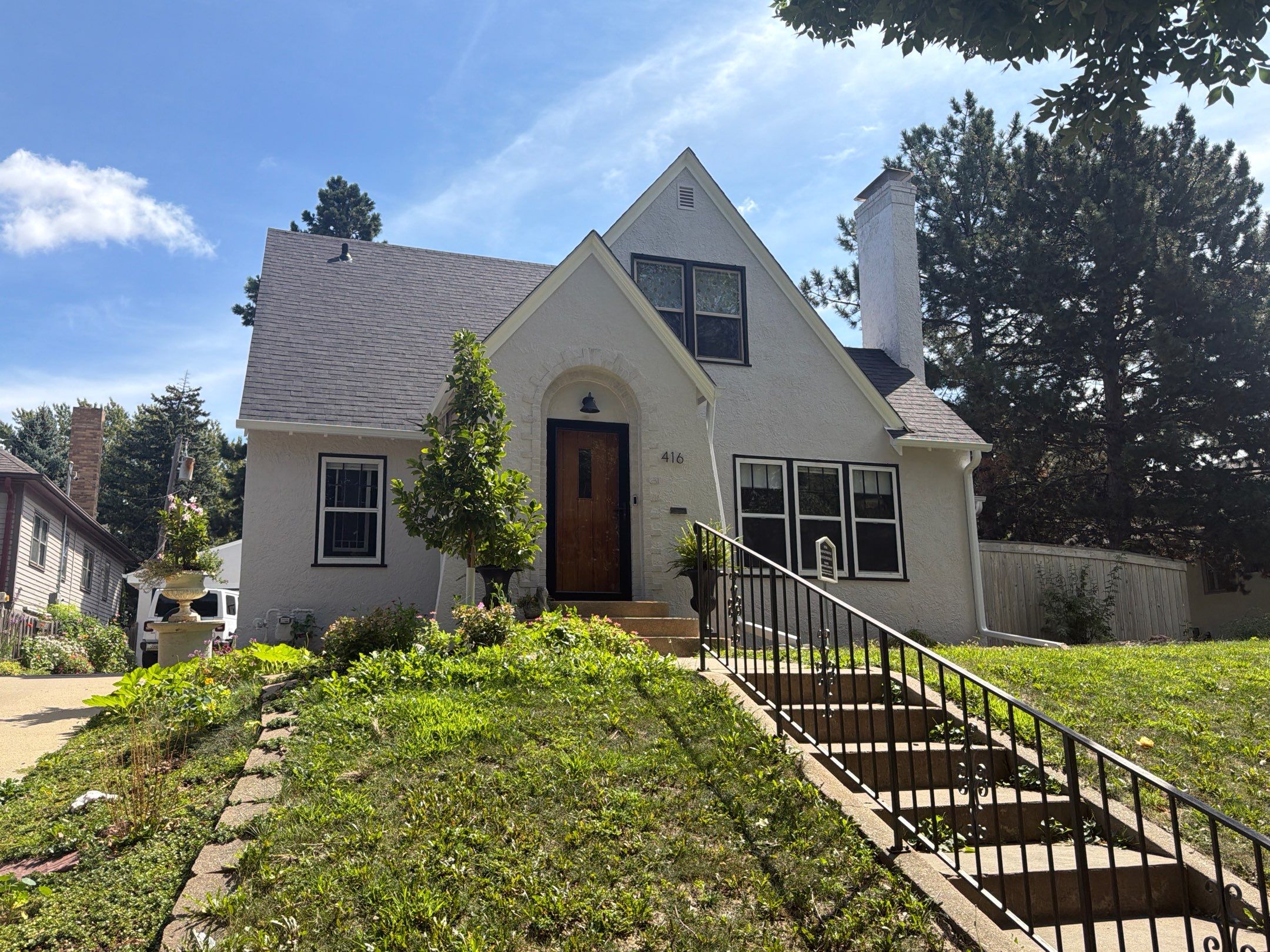 Exterior Stucco Painting and Trim Refresh in Sioux Falls by Select Painting, Coatings & Garage Cabinets