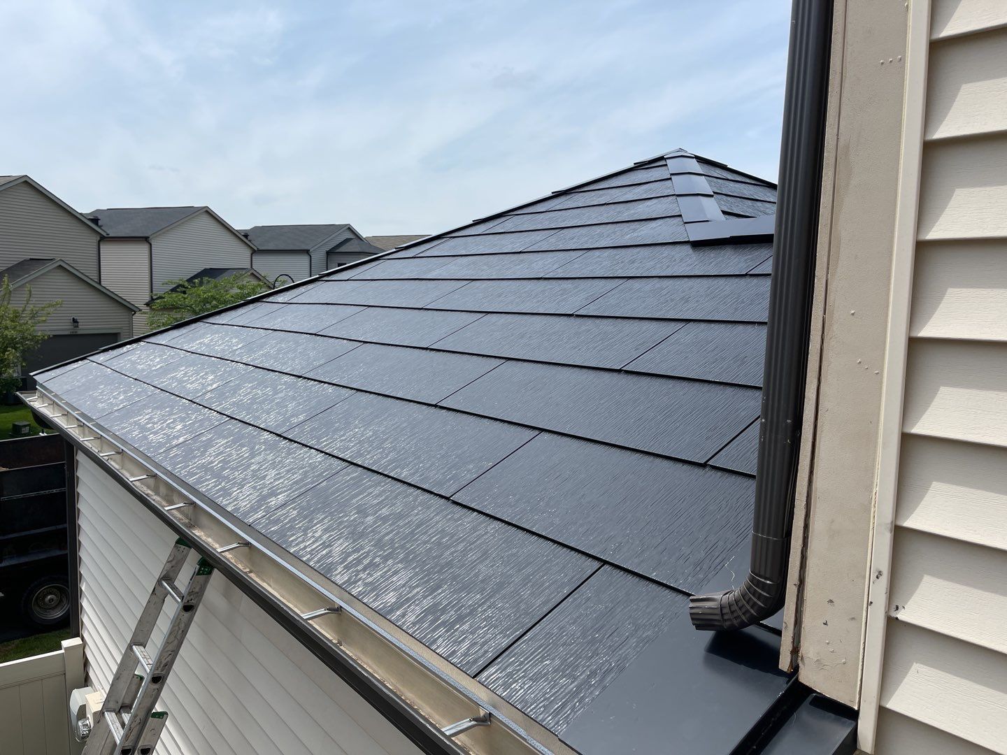 Tesla Solar Roof using Tesla Solar Roof V3 tiles by American Home Contractors