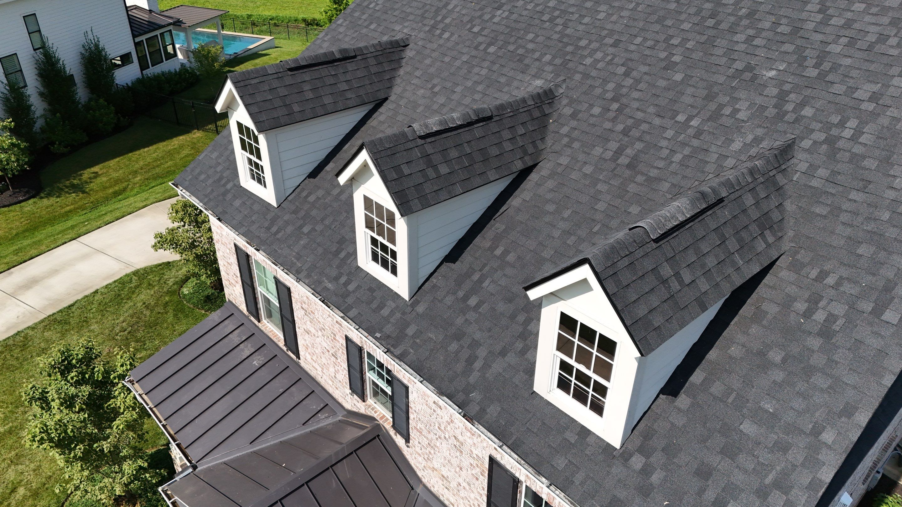 Charcoal Black Re-Roof by Royal House LLC