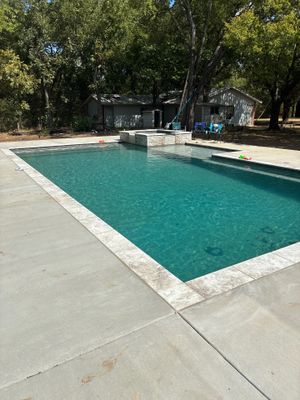 Classic Rectangular Pool with Travertine Deck