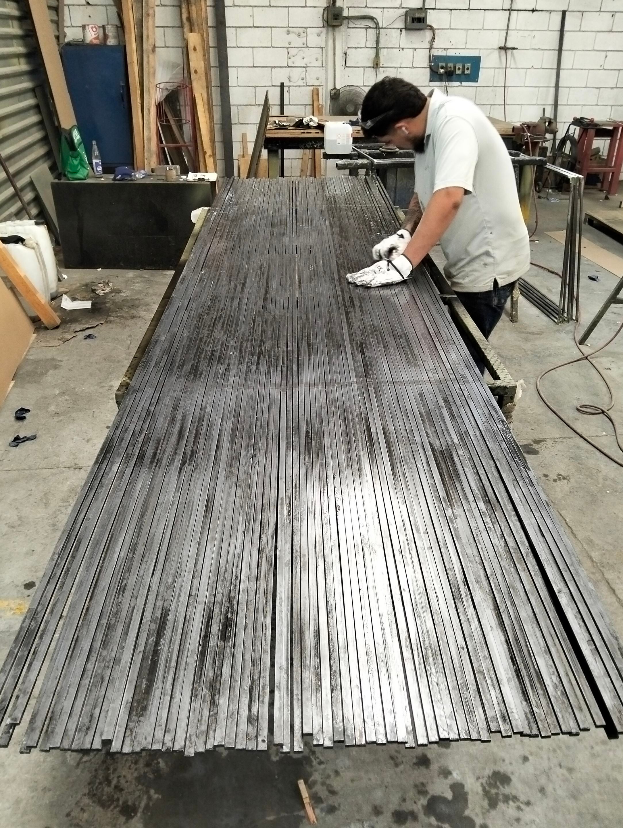 Custom Steel Oporto Pivot Door Installation for Dallas New Construction by Solara Custom Living