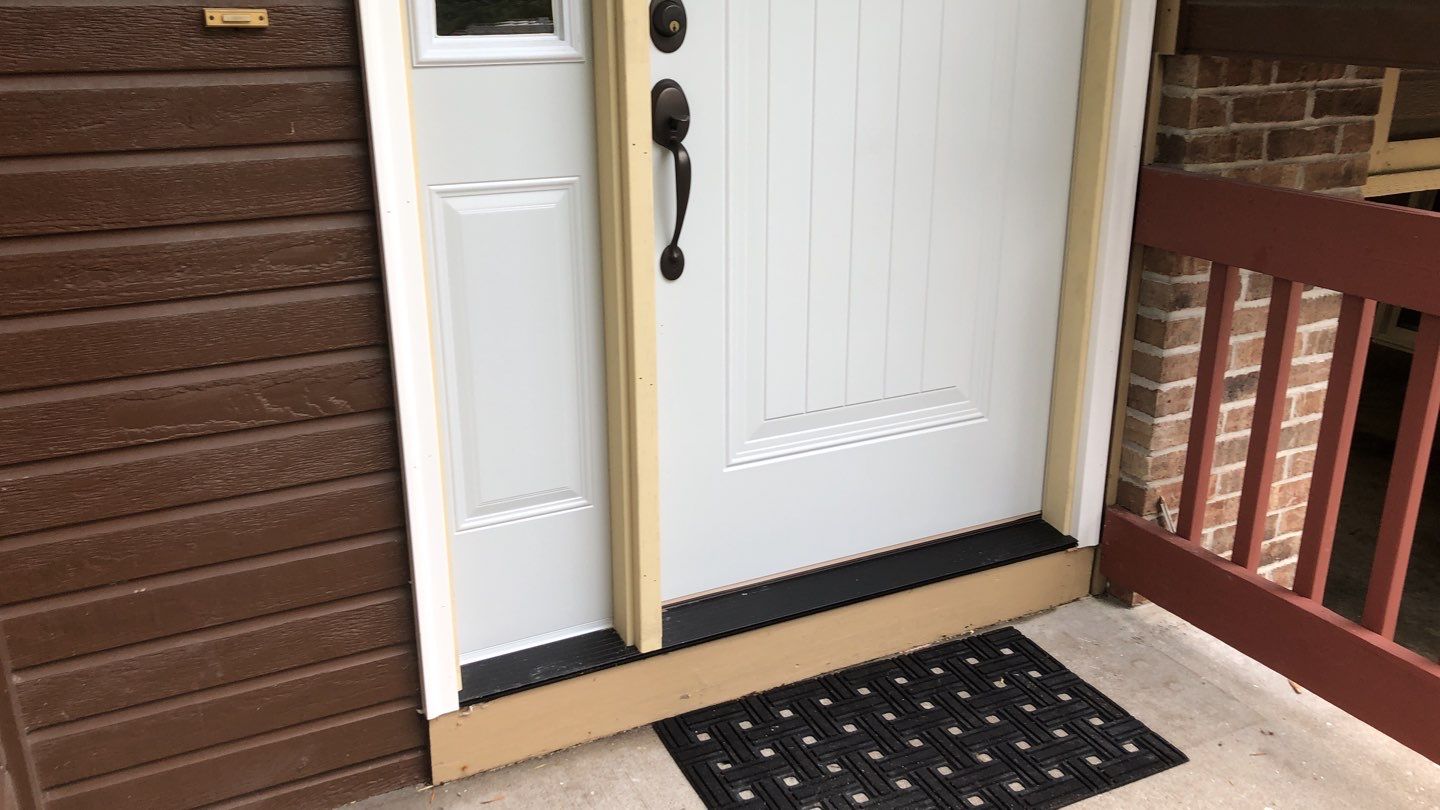 Siding Installation using Heartland Patio Door by EEC  Windows, Siding & Roofing 