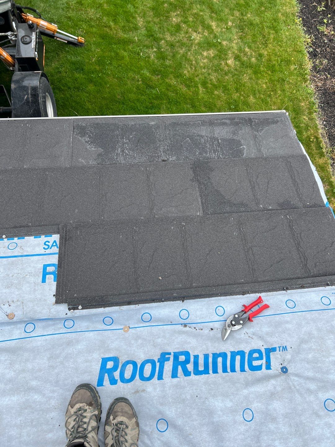 Residential Roofing Repair using Metstar Stone Coated Charcoal by Nitro Roofing and Construction