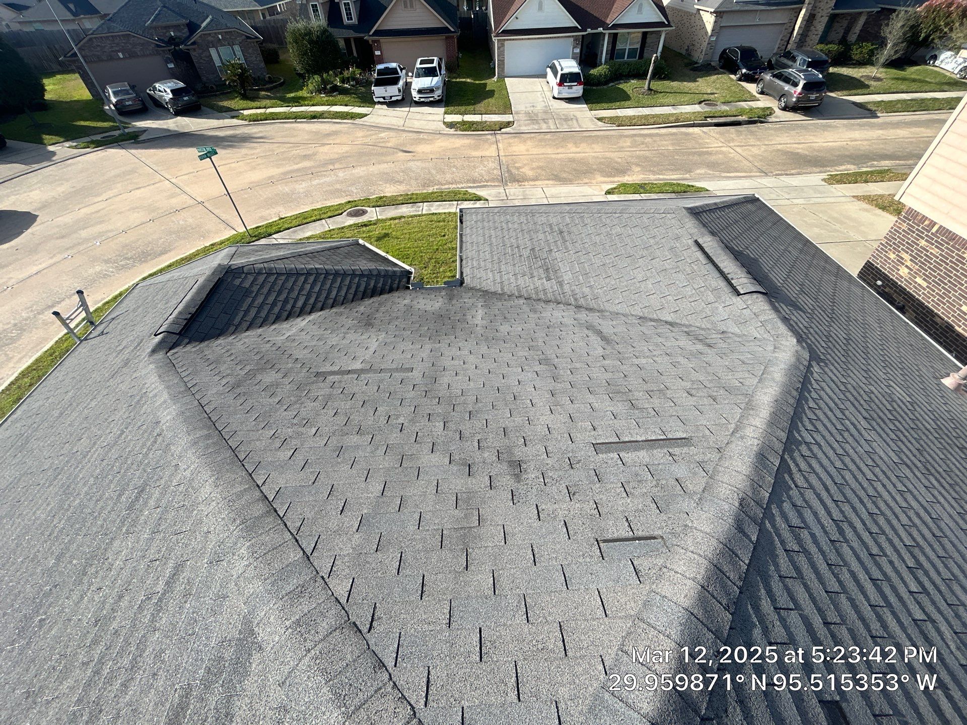 Reroof and Gutter Project in Houston by Roofing Technologies Unlimited