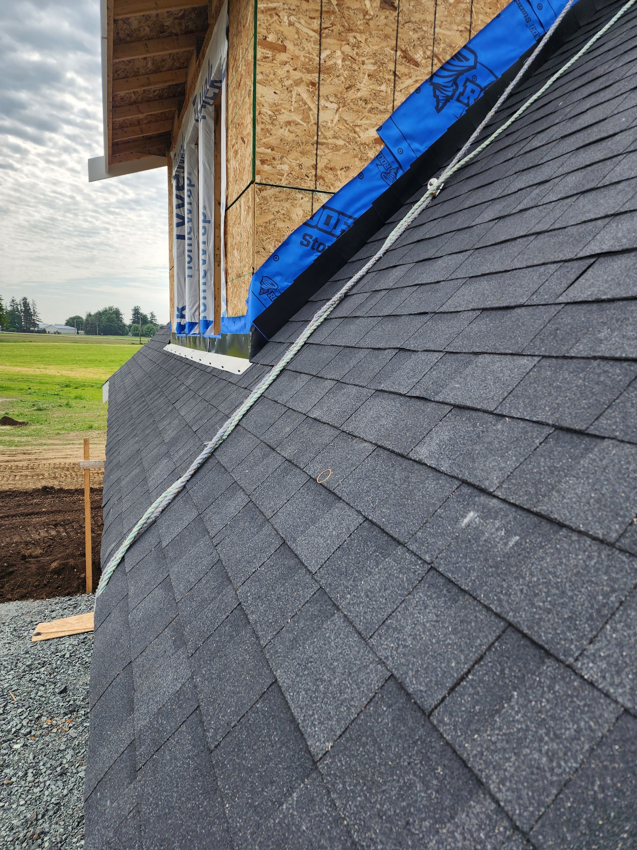 Residential Roofing Installation using OC Oakridge shingles by Top Notch Roofing Inc