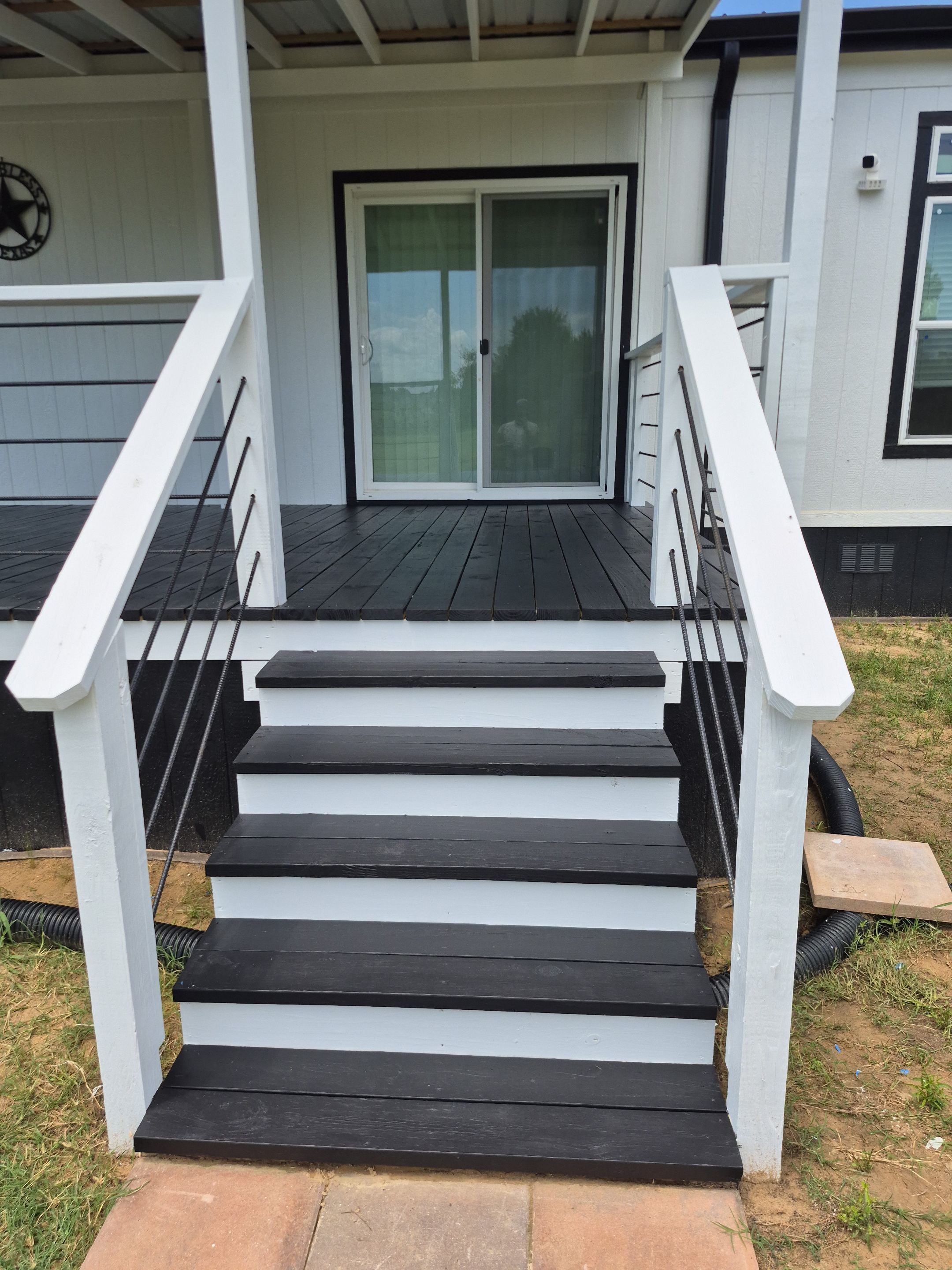 A Modern Makeover for Three Decks in Tyler TX by Quality Coats Painting