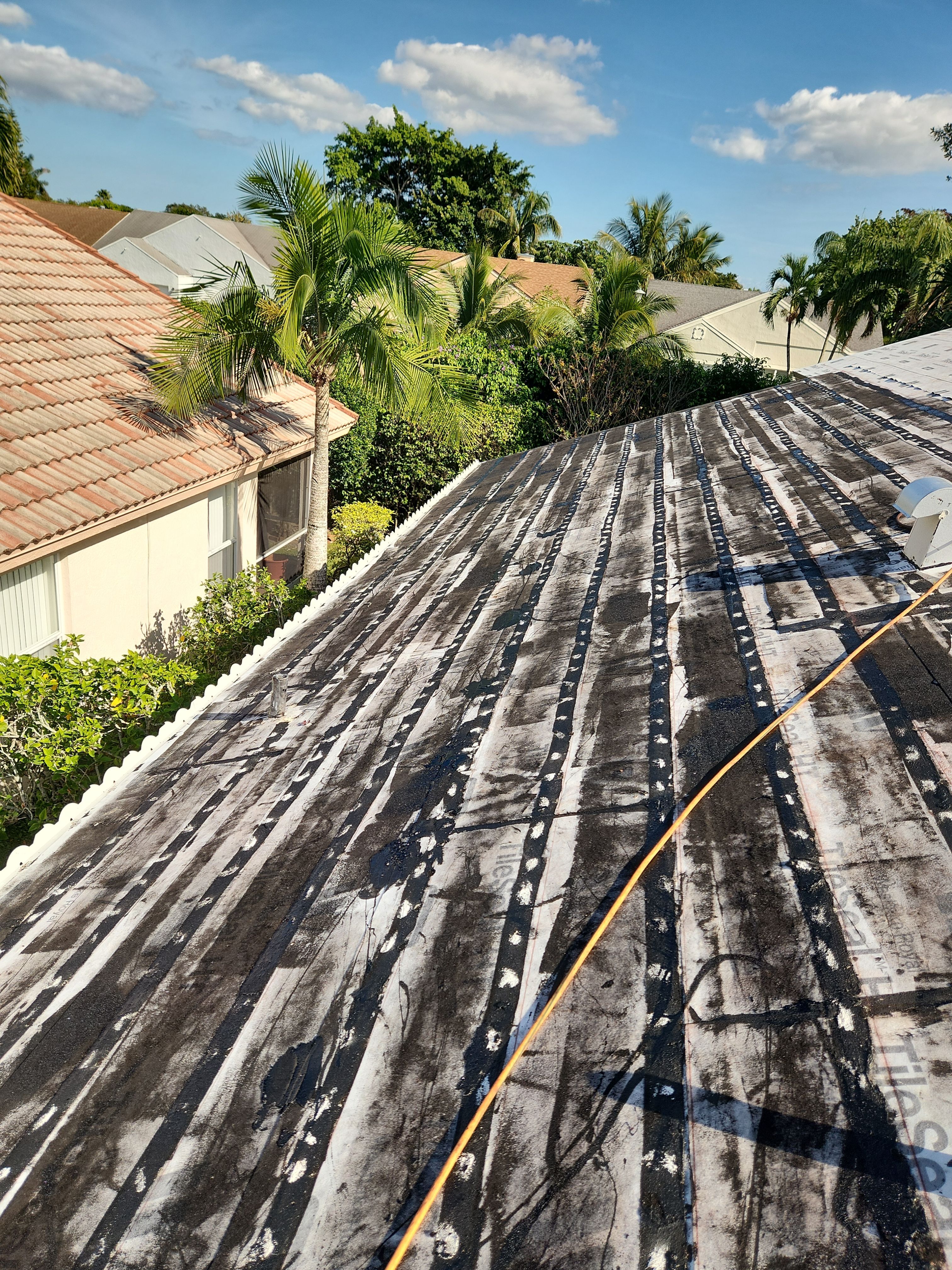 Concrete Tile Roof Replacement and Wood Decking Repair in Boca Raton by Aastro Roofing