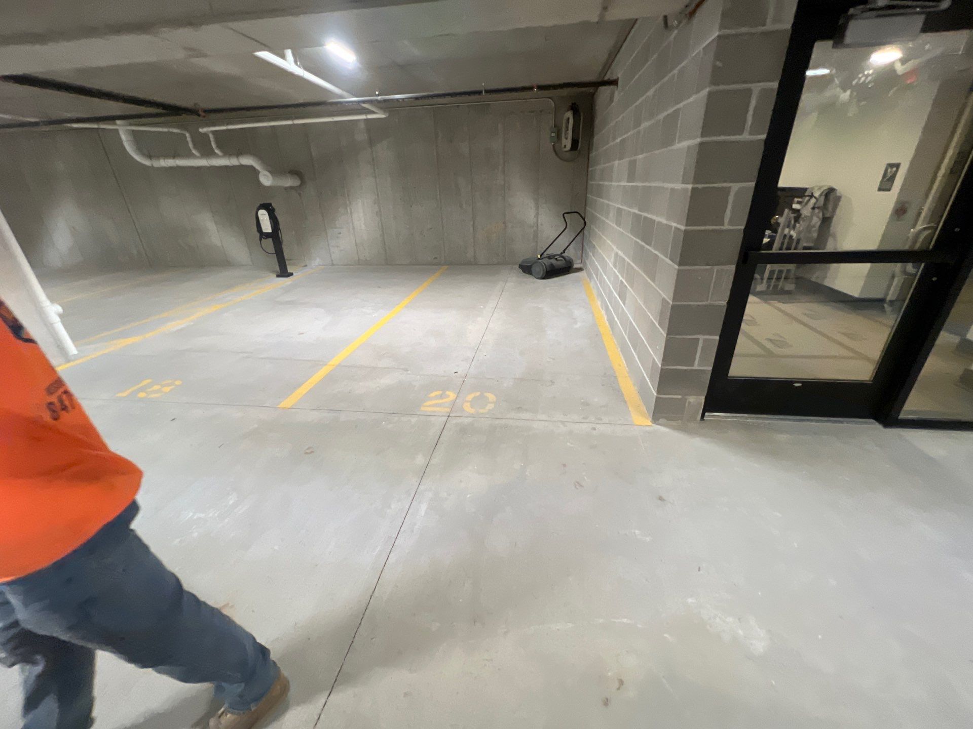 Parking garage using Hot water by Northern Power Washing LLC.