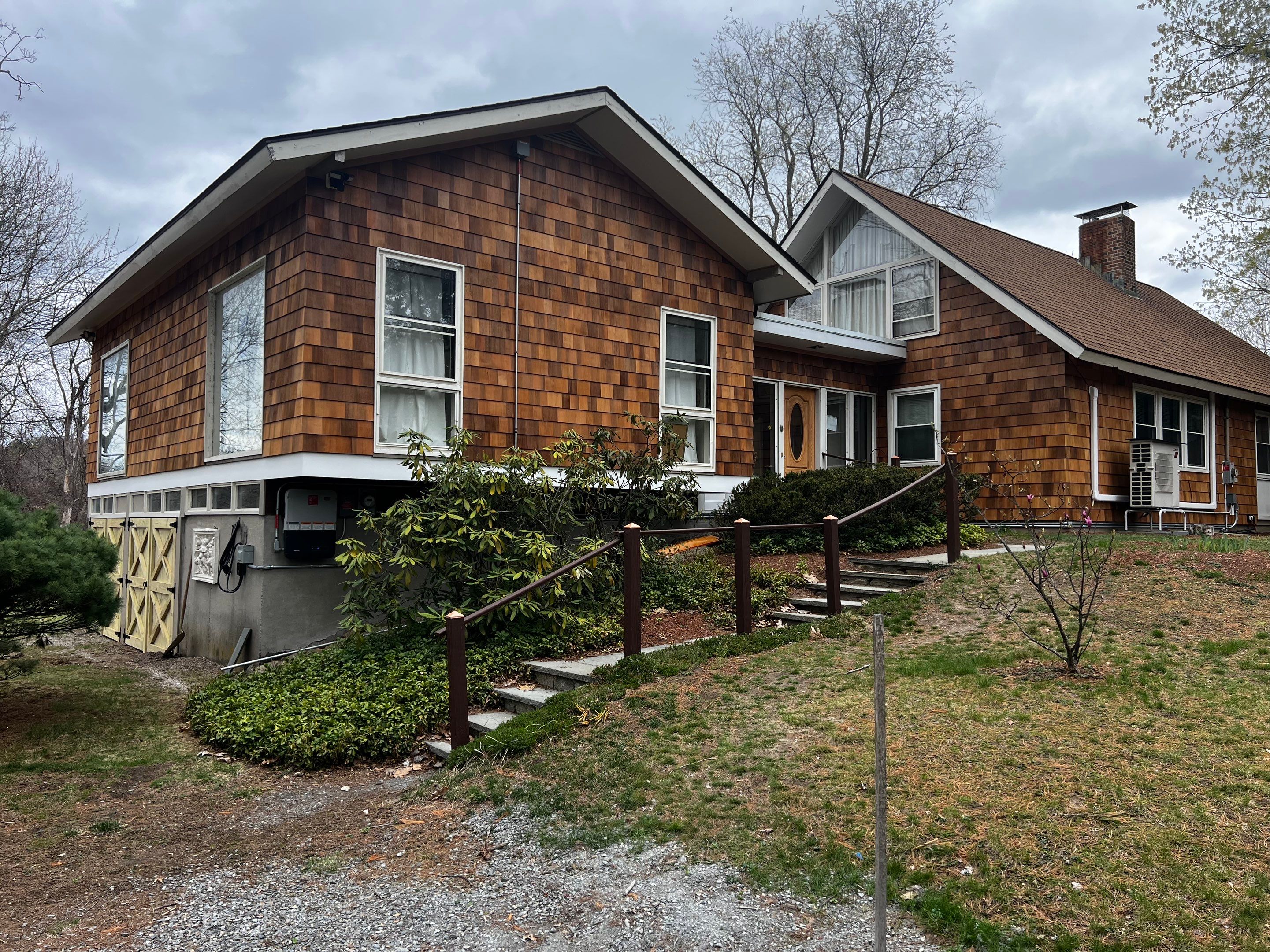 Siding Installation using Perfection Red Western Cedar Shingles  by Loyalty Exterior Solutions 