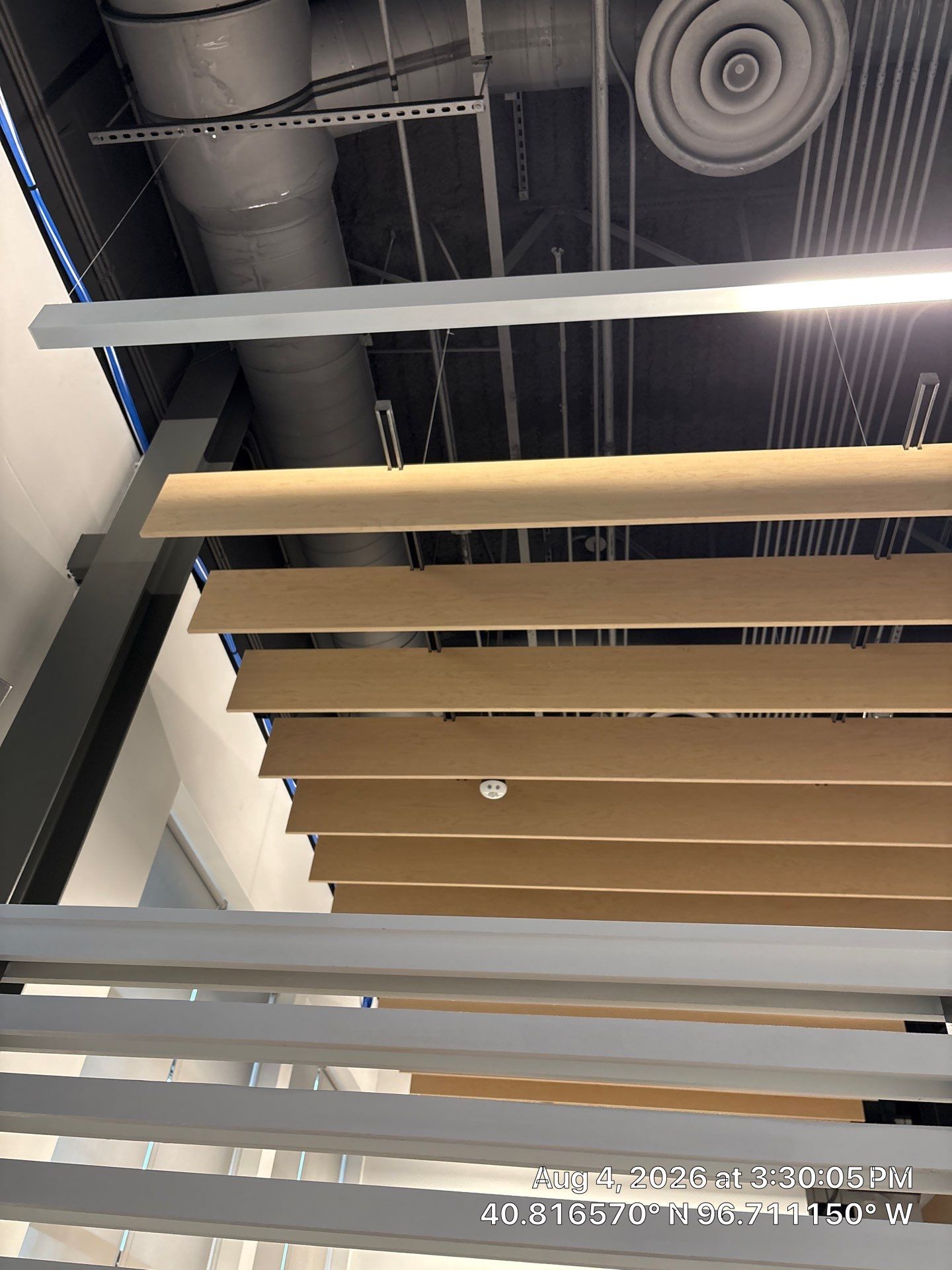 Commercial Office Interior Renovation with Acoustic Ceiling Baffles by CompanyCam Sales Demo