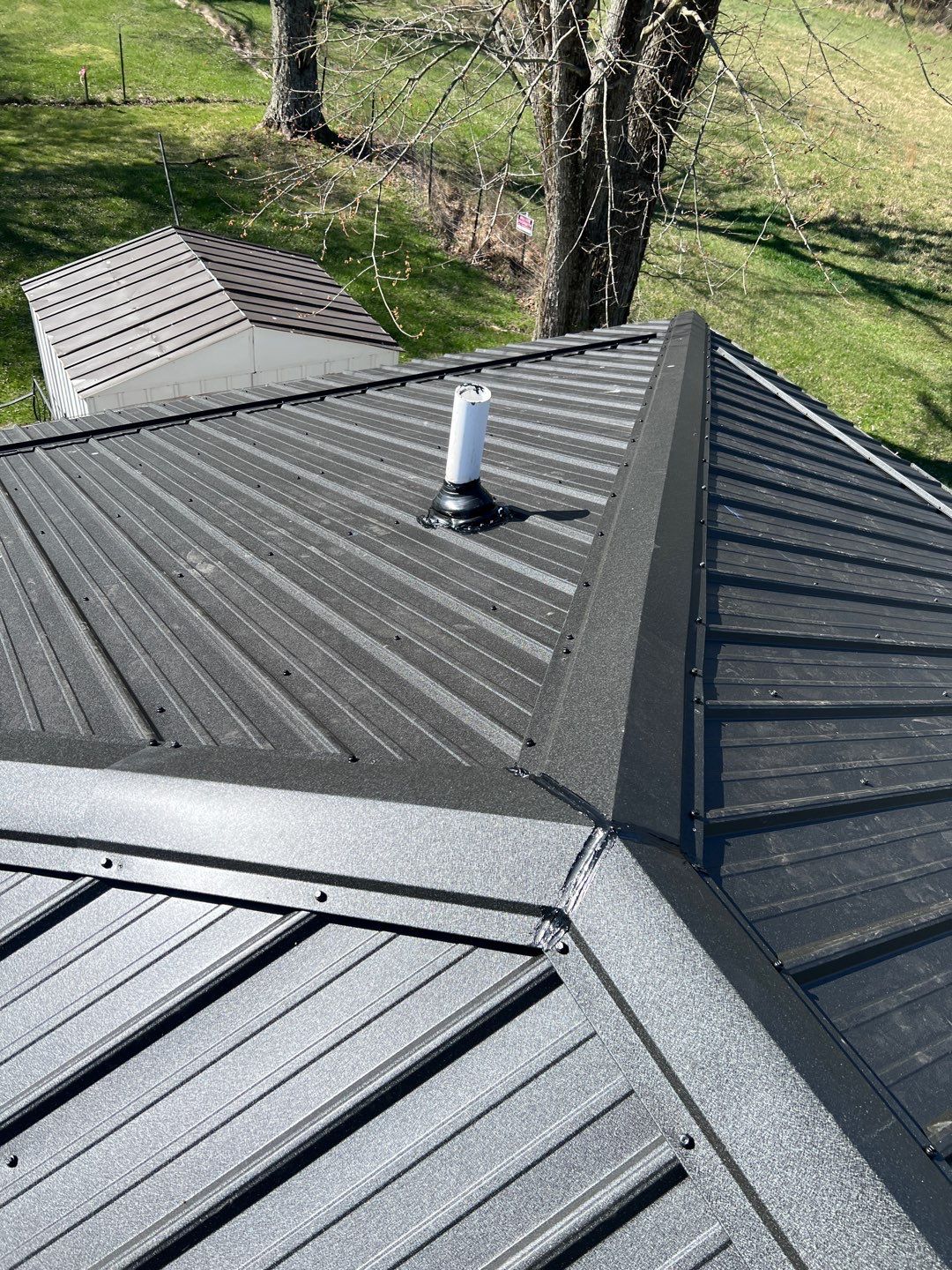 Commercial Roofing Installation using Performance Panel Metal - Frost Black by RoofX 
