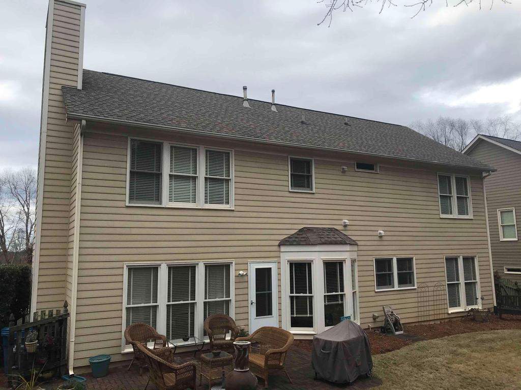 Exterior Painting, James Hardie Siding Install, and Gutter Replacement in Alpharetta, GA - After Results Taken Six Years After Painted by Nelson Exteriors 