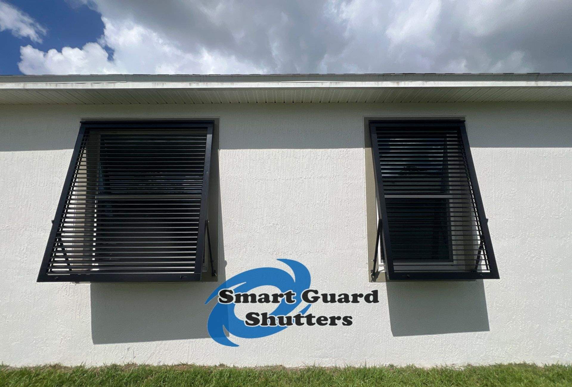 Impact Rated Bahama Shutters in Matte Jet Black by Smart Guard Shutters
