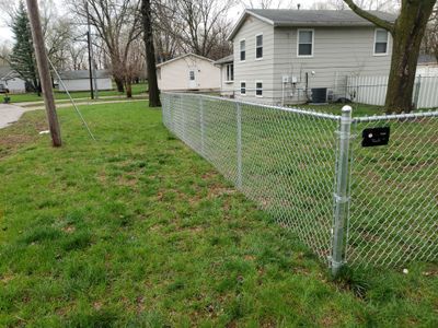 Galvanized Chain Link and Horizontal Wood Privacy Fencing in Waterloo