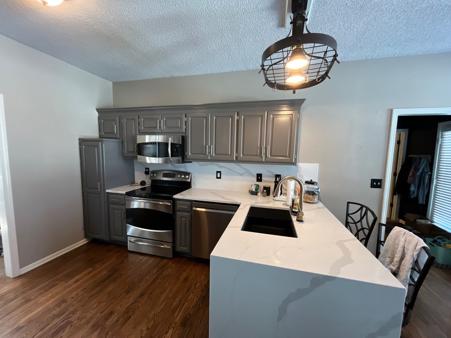 Cabinet Refresh – From Classic White to Modern Gray by Cougar Painting