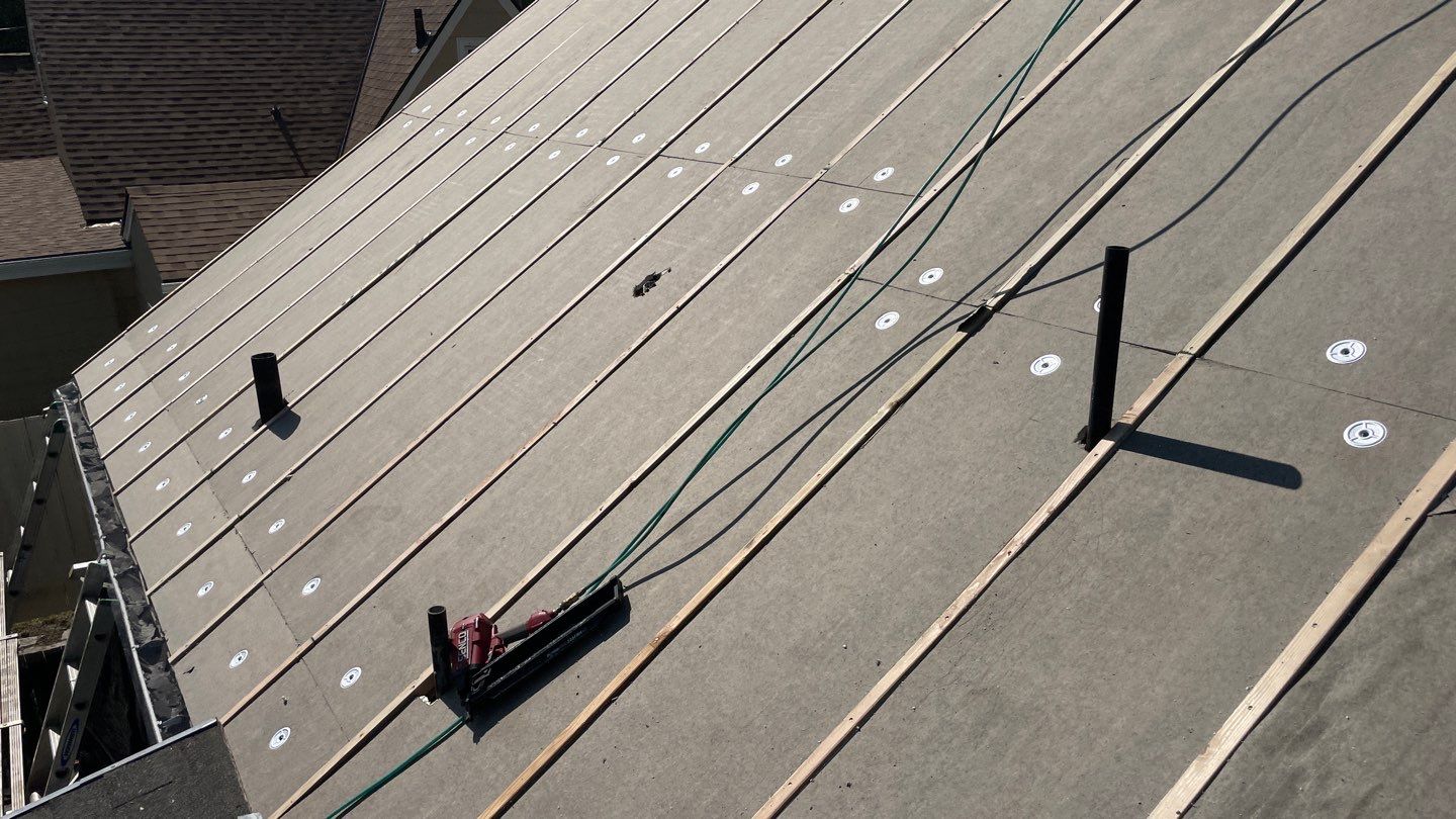 Residential Roof Installation with Added Insulation Barrier  using Malarkey Vista AR Shingles (Color: Storm Grey) by Orezona Building & Roofing Company, Inc.