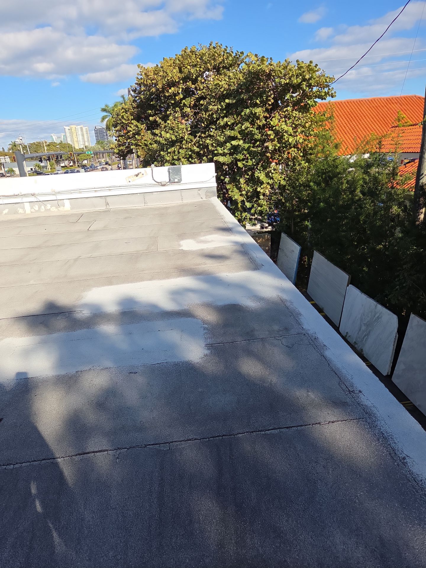 Commercial Flat Roof Restoration Using Silicone Coating in Hallandale Beach by Aastro Roofing