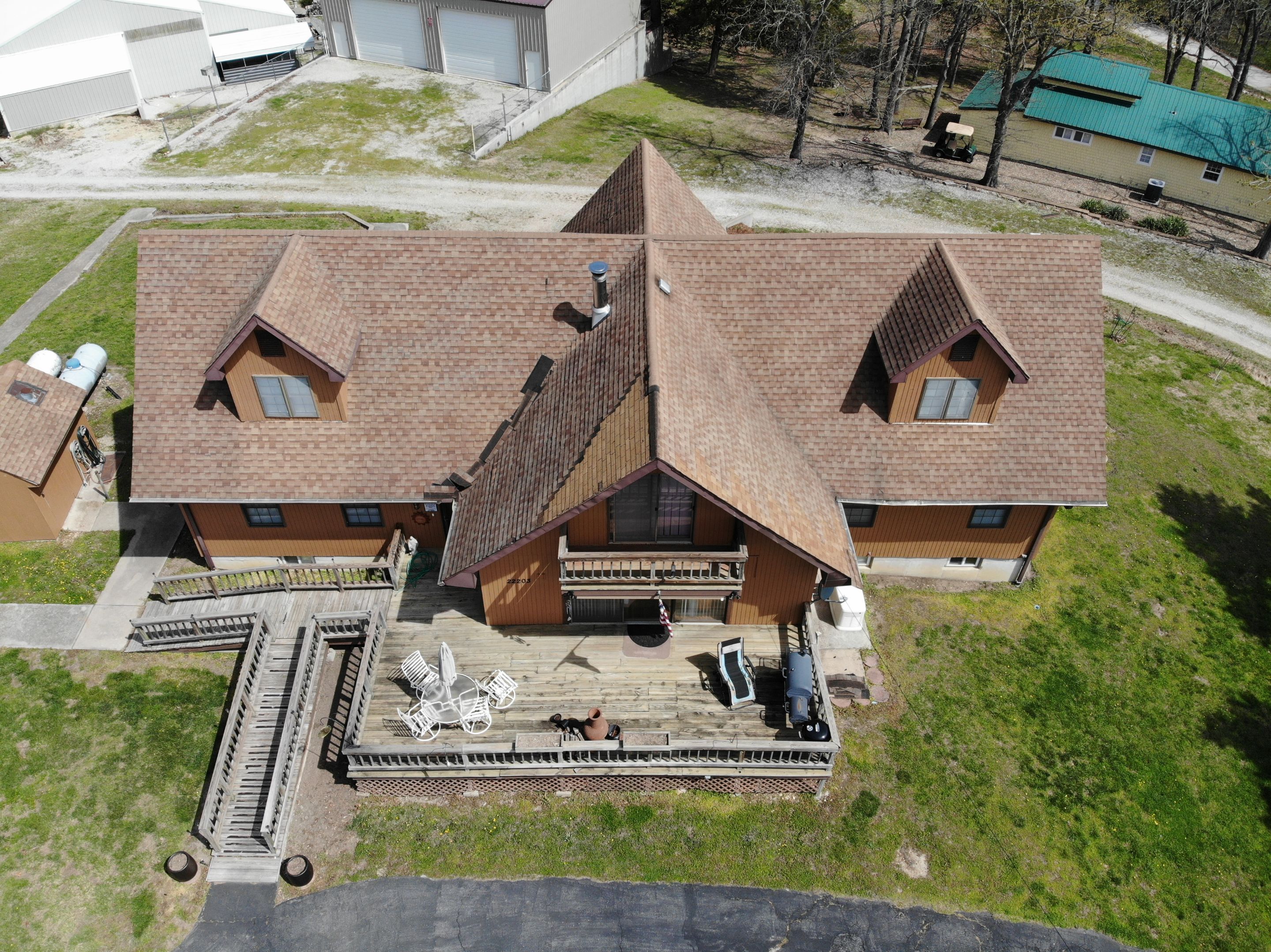 Residential Roofing & Snowguard Install - 29 Gauge G-Rib Metal - Color Copper Metallic  by Titan Commercial & Residential Roofing 