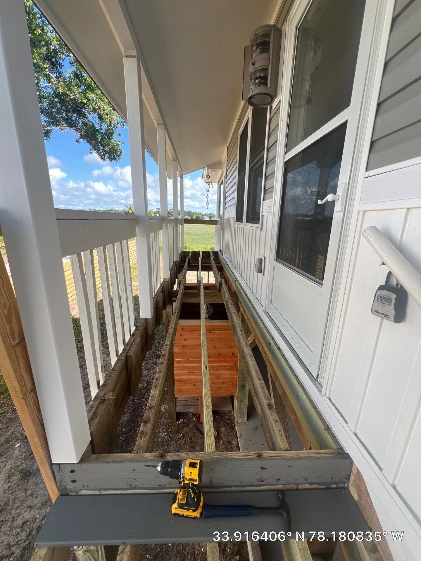 Exterior Stair Repair and Sidewalk Installation in Oak Island, NC by RGR Construction and Roofing, LLC