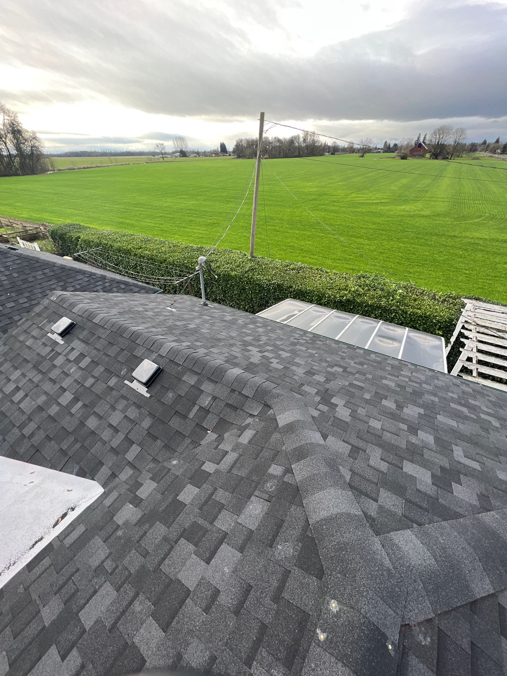 Residential Roofing Installation using IKO Dynasty (Color: Granite Black) by Orezona Building & Roofing Company, Inc.