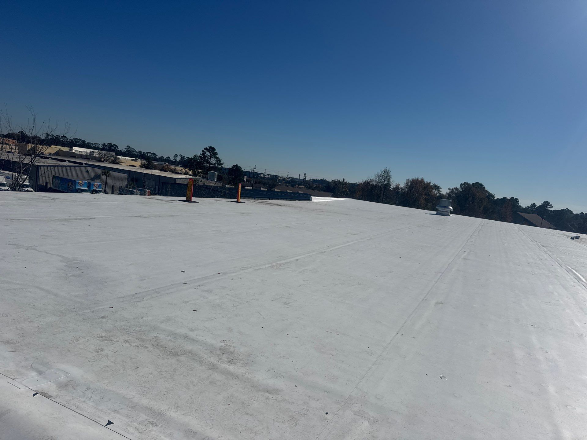 Commercial Roof Replacement using Carlisle Sureweld TPO at Ferguson Plumbing by Roof Experts