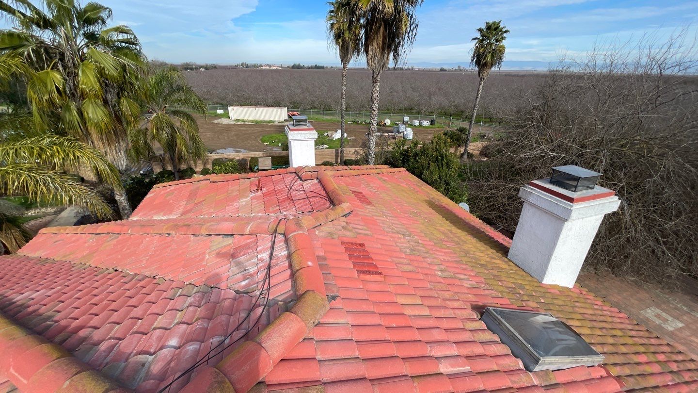 Tile refurbish project using existing tiles and replaced underlayment and battens by Straight Edge Roofing Inc