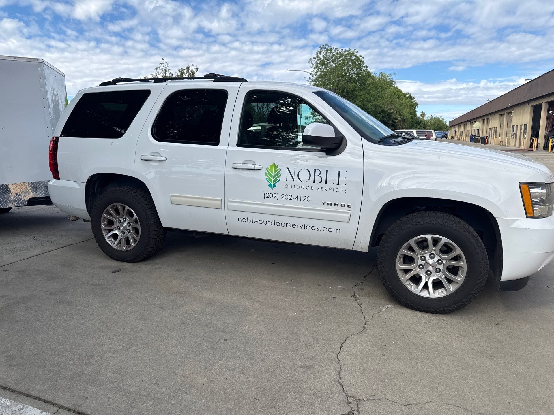 Fleet Branding and Vehicle Graphics for Noble Outdoor Services by City Signs