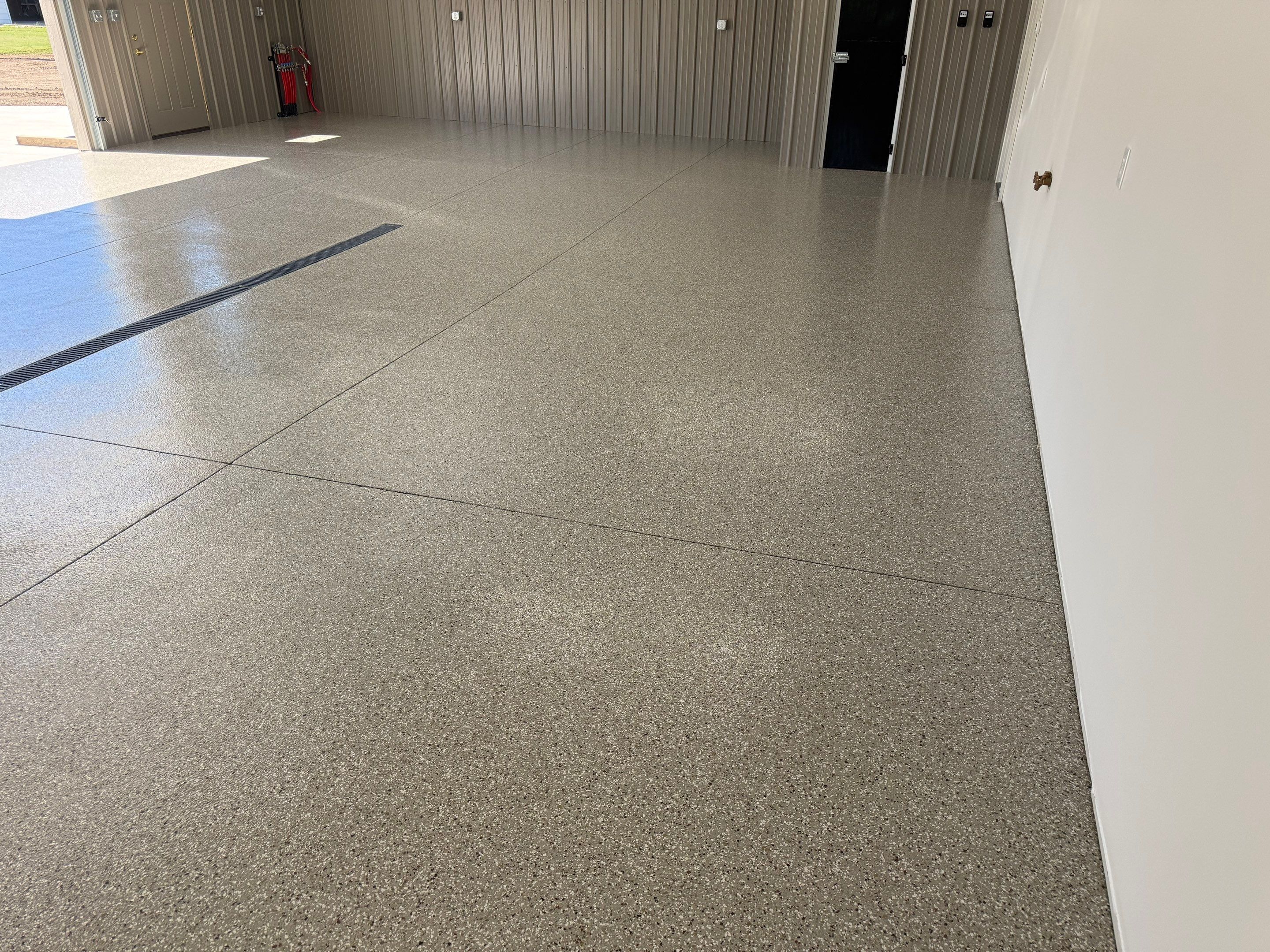 Creekbed Flake Coating in Woonsocket, SD by Select Painting, Coatings & Garage Cabinets