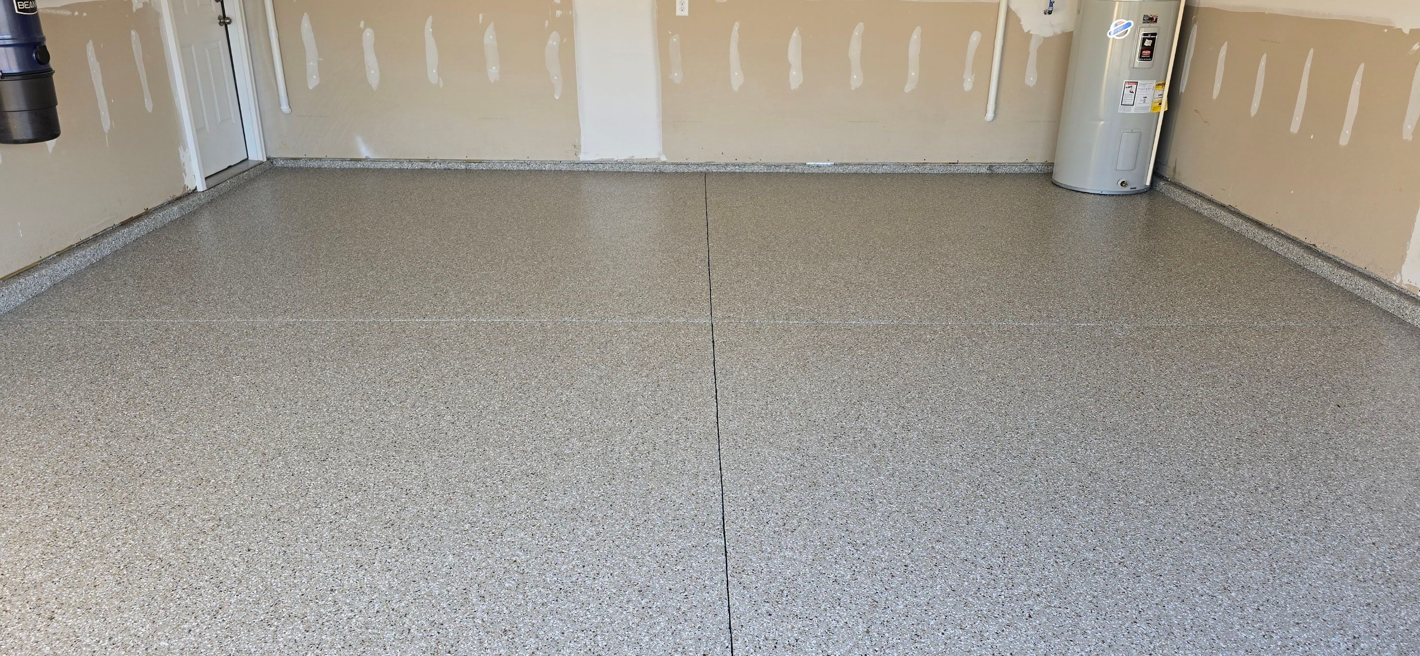 Driveway, Garage, & Front Porch using Creekbed by Elite Floor Solutions