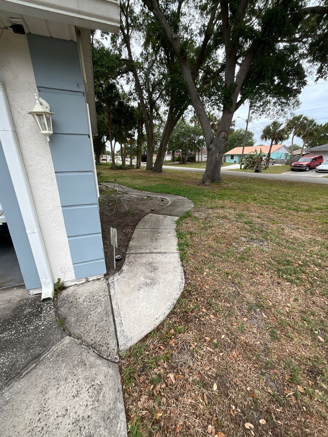 Driveway and Garage using Tidal Wave by Amvet concrete coatings llc