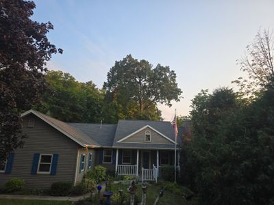 Residential Roof Installation in Sheboygan Falls, WI: GAF Timberline Natural Shadow Shingles & Rain Drop Gutter Protection