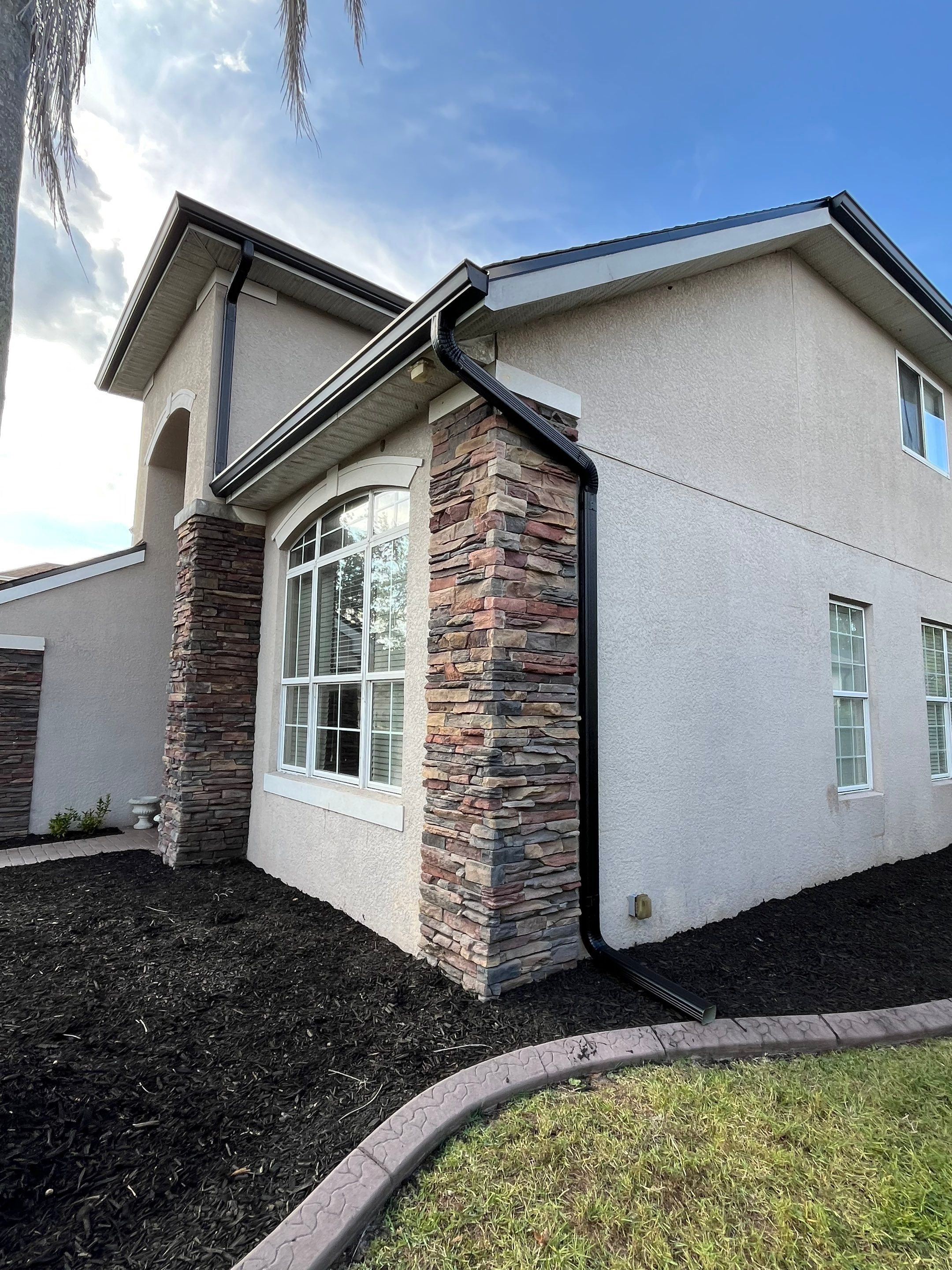 Black 6-inch Seamless Gutters for Modern Ellenton Homes FL by Gutter Professors