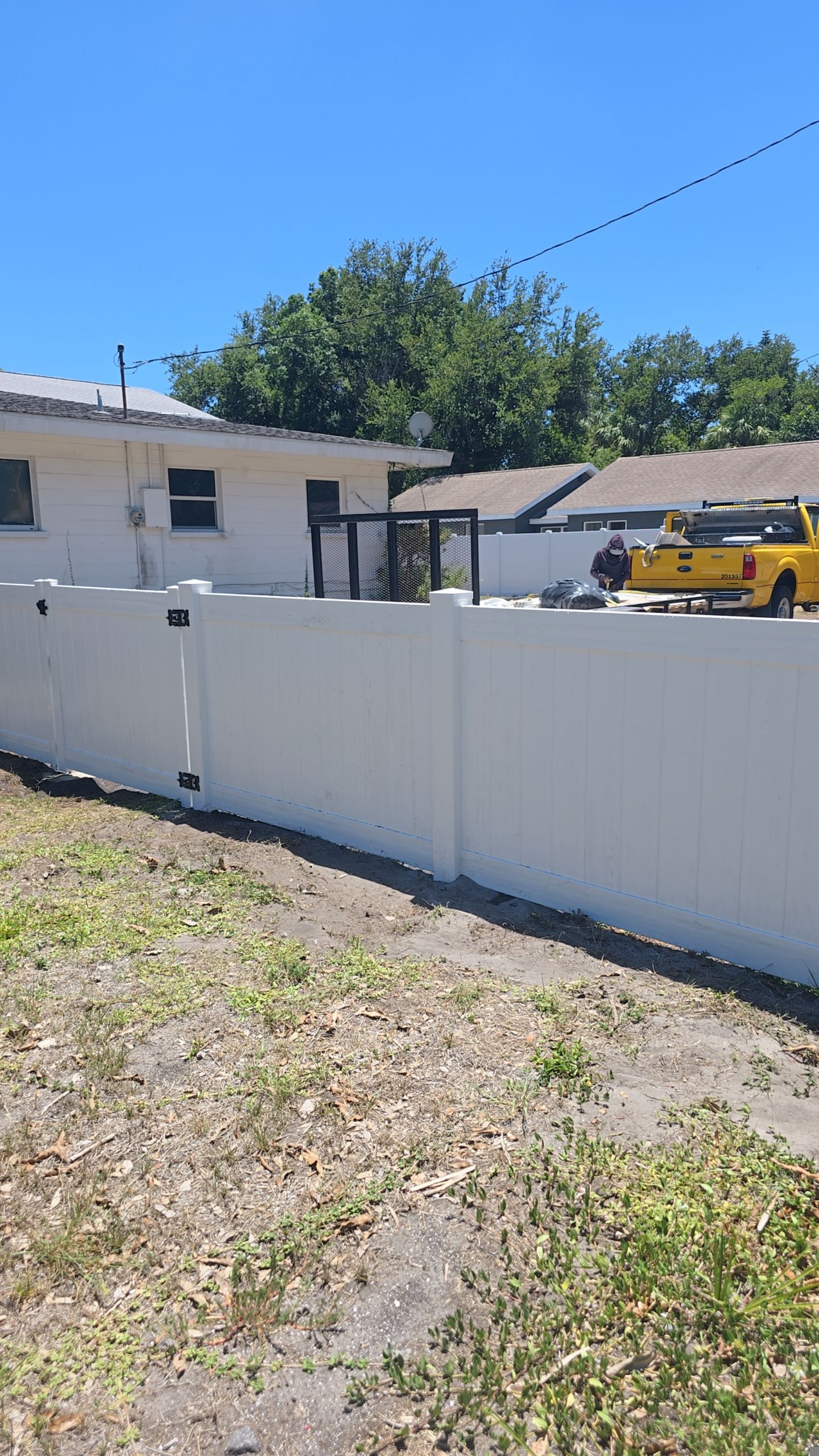 White Vinyl Privacy Fence and Gate Installation in Bradenton by True Fence LLC