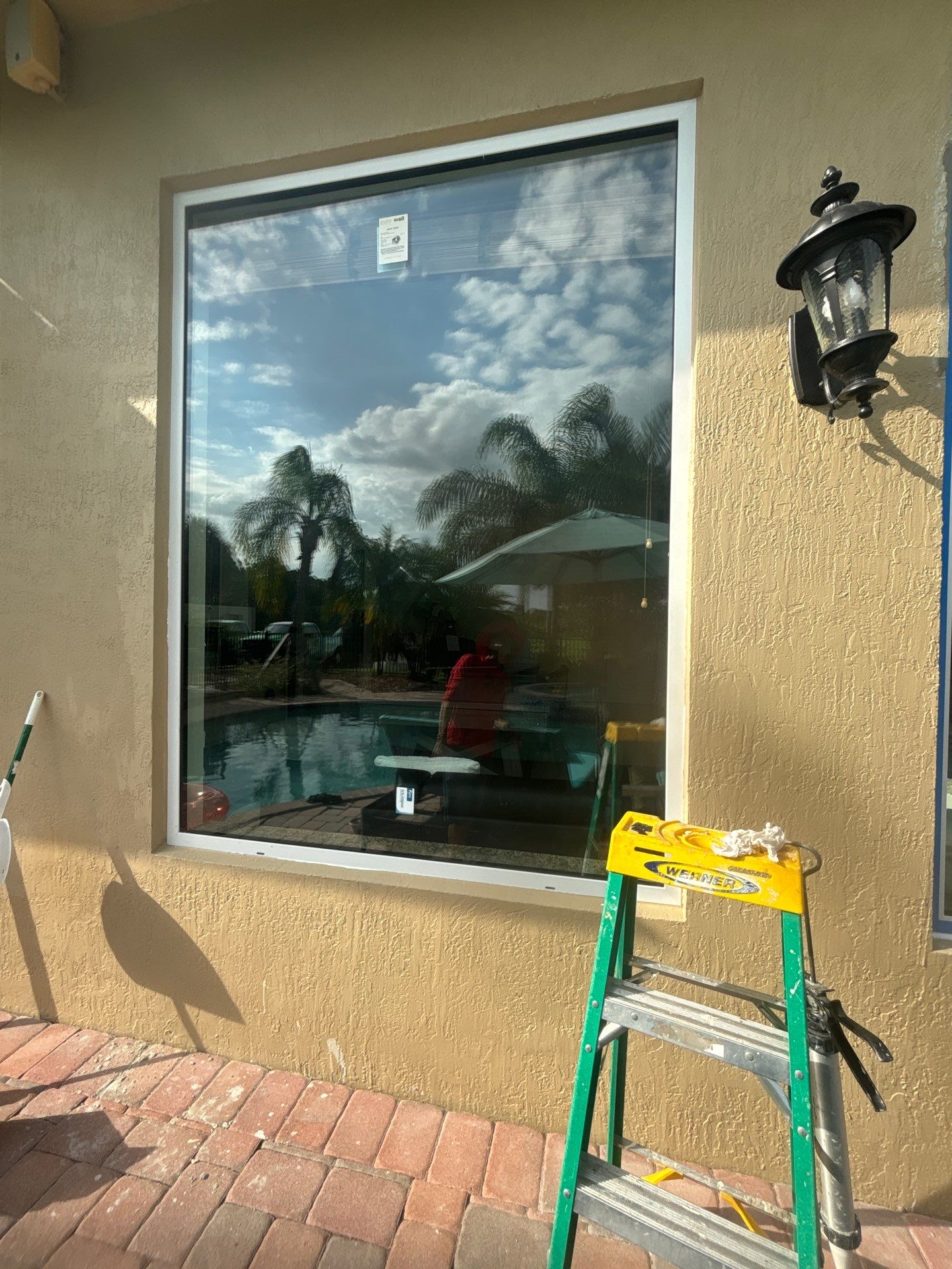 PGT Black pocket doors and Euro-Wall storefront & SGD by Windows For Life 