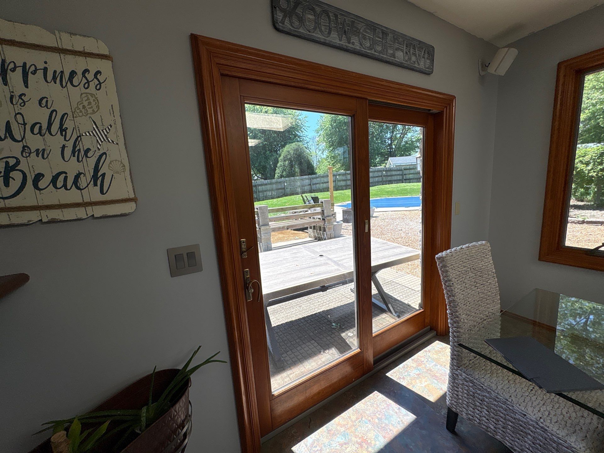 Custom Front Entry and Sliding Patio Door Replacement in Greenwood by Merrifield Exteriors, LLC