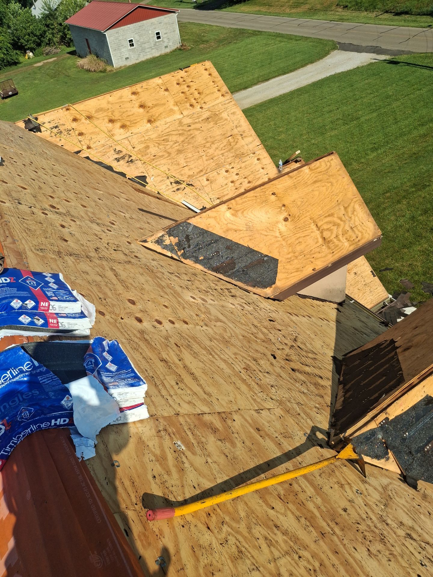 Residential Roofing Installation using GAF Timberline HDZ Charcoal by Rainstoppers Roofing