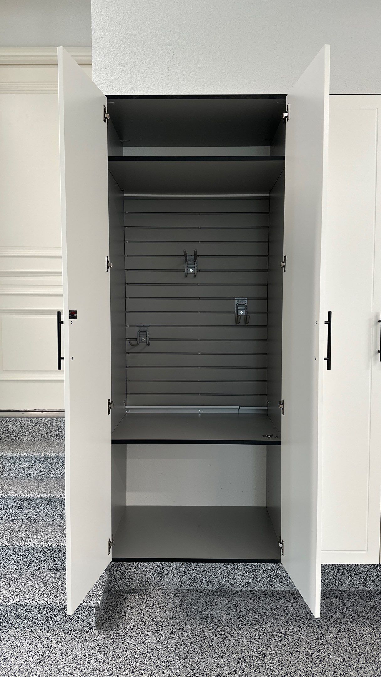 Mike & Pam transformed their garage with a Banner Garage Floor and Cabinets by Banner Garage