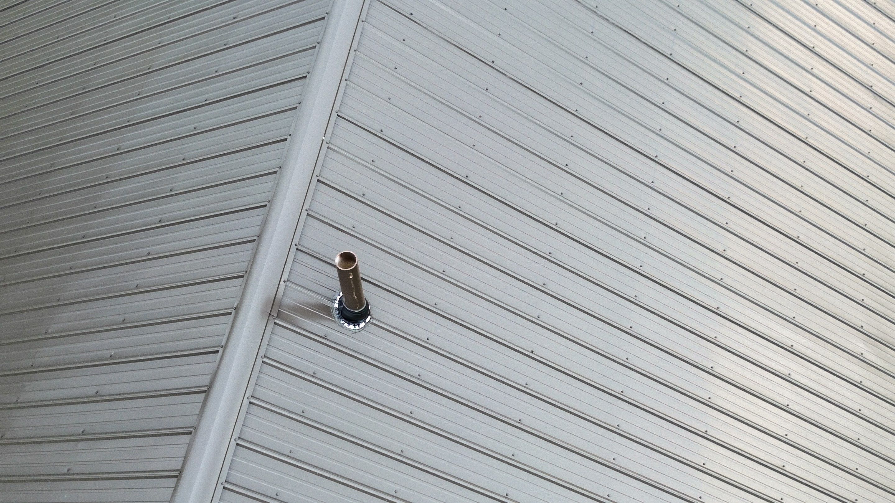 Residential Roofing Installation using Performance Panel Metal - Burnished Slate by RoofX 