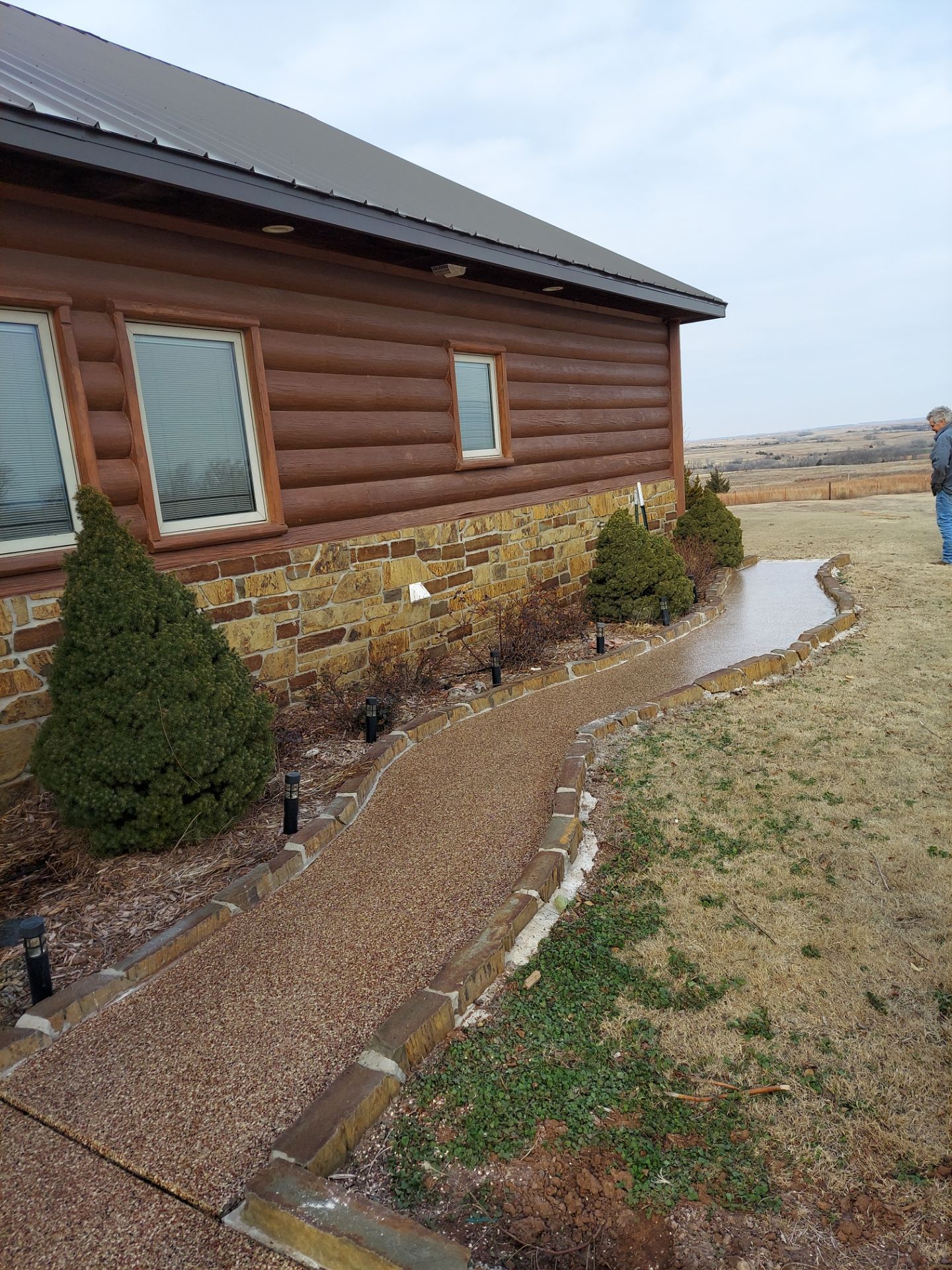 Patio Coating Installation with Chestnut by Copperhead Coatings
