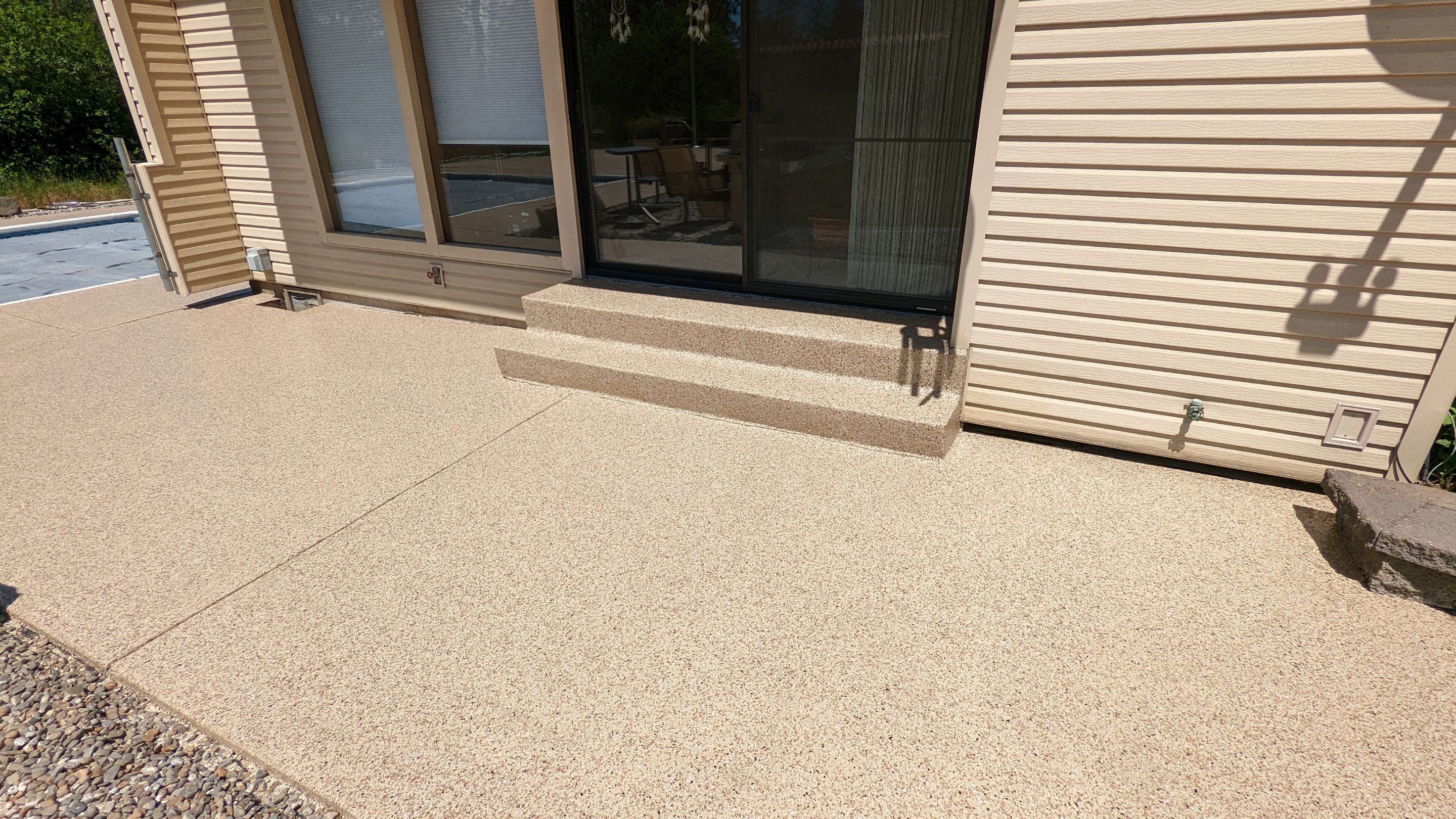 Garage Transformation using Domino for Garage and Pecan for Pool Deck by Croc Coatings, LLC