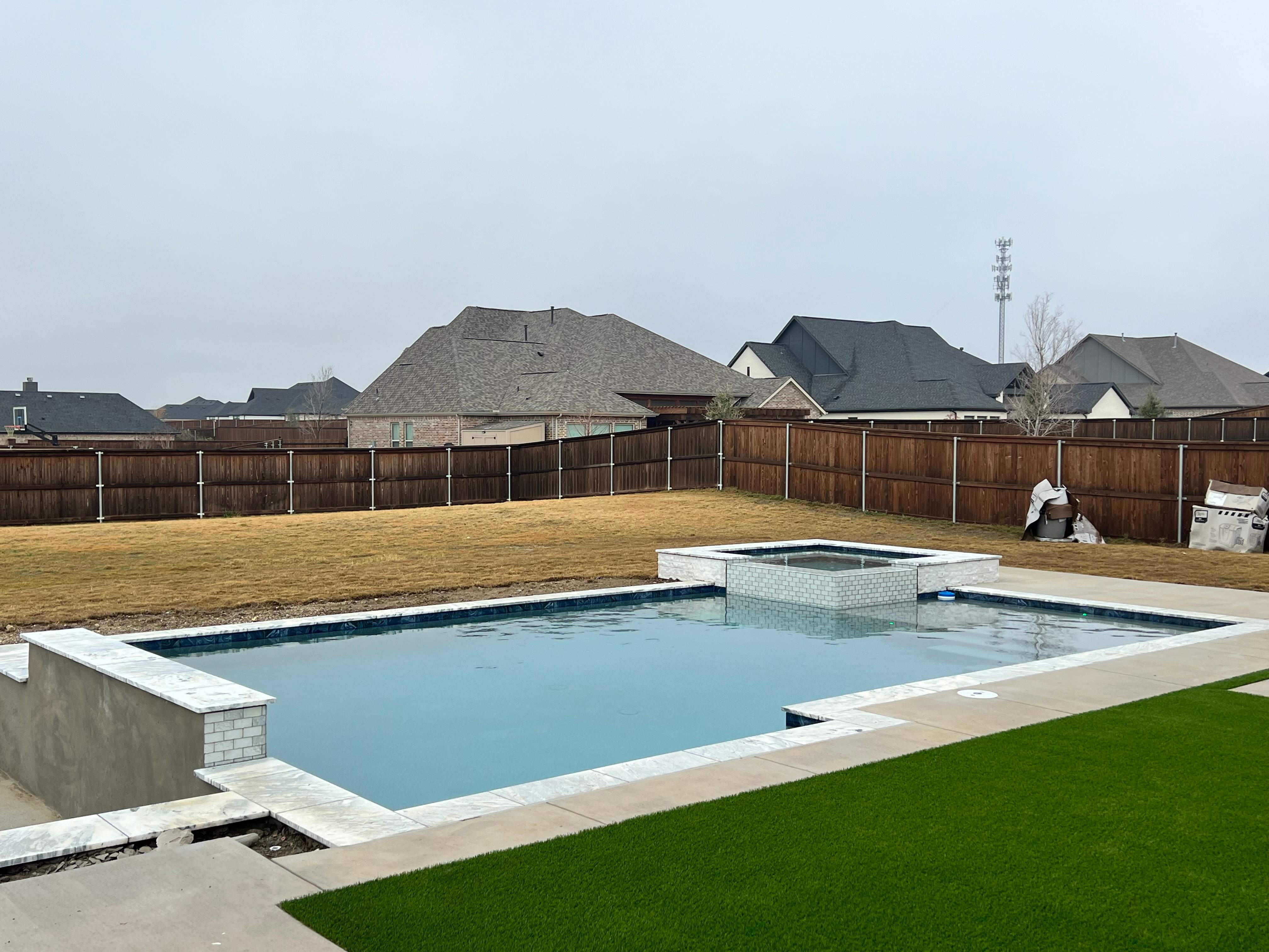 Geometric Pool with Raised Spa by Pinnacle Pools and Spas - DFW
