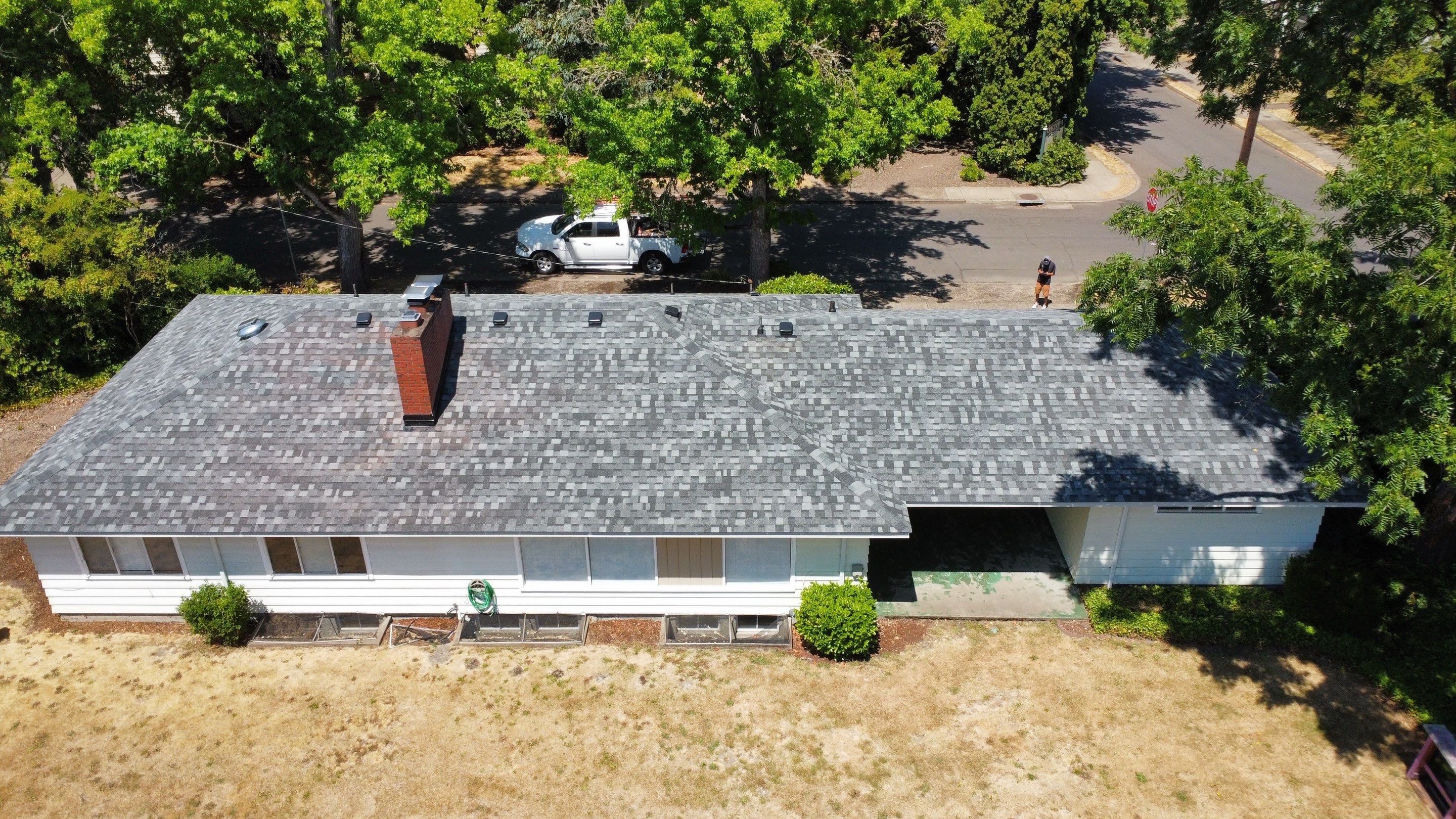 Residential Roofing Installation using IKO Dynasty (Color: Summit Grey) by Orezona Building & Roofing Company, Inc.