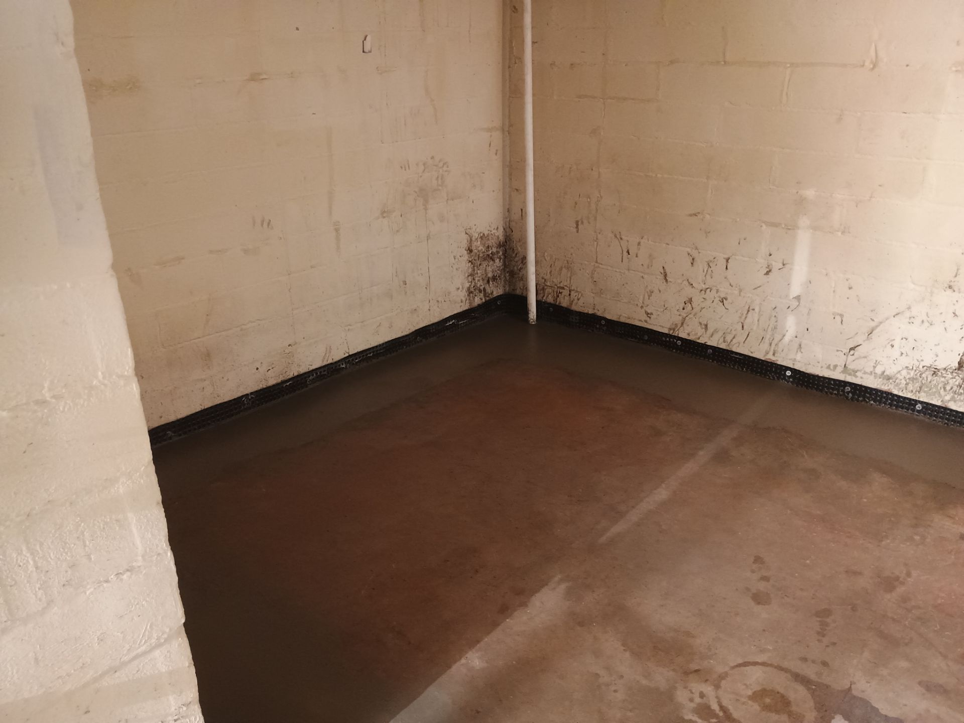 Interior Drain Tile & Sump Pump System in North Minneapolis by Waterproofing Northeast