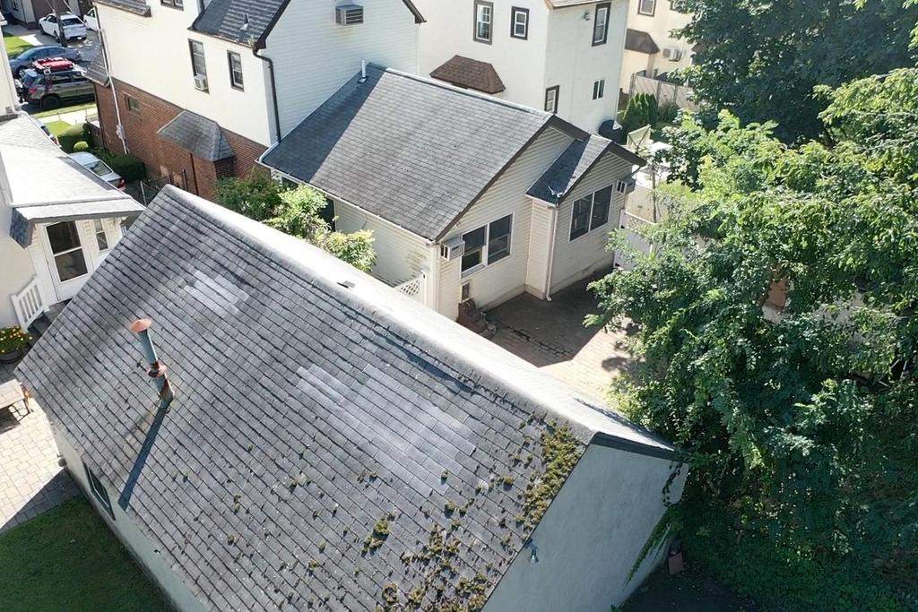 New Roof & Gutters by Island Roofing Inc.