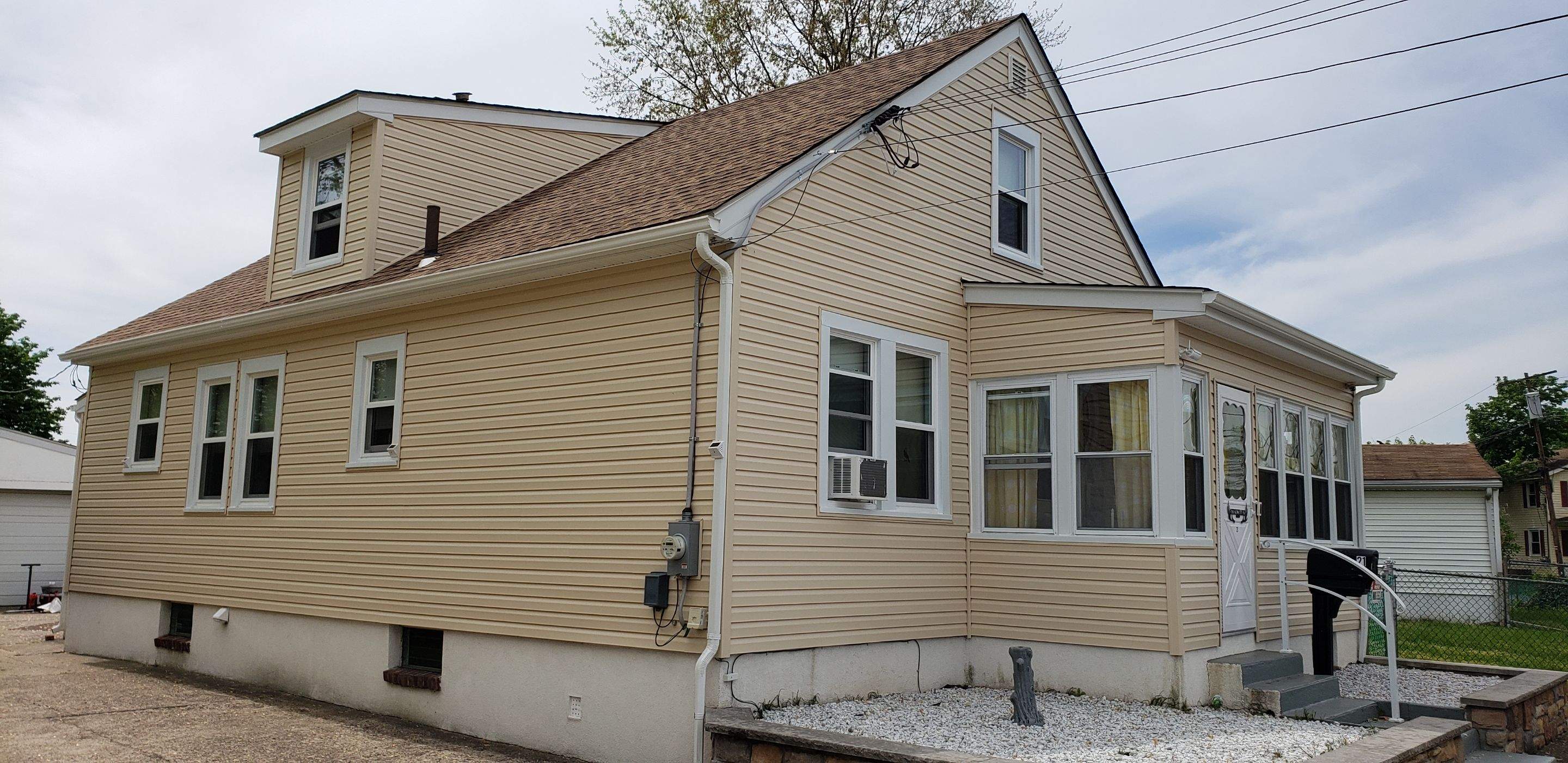 New Siding and Gutters by Stofan Construction LLC