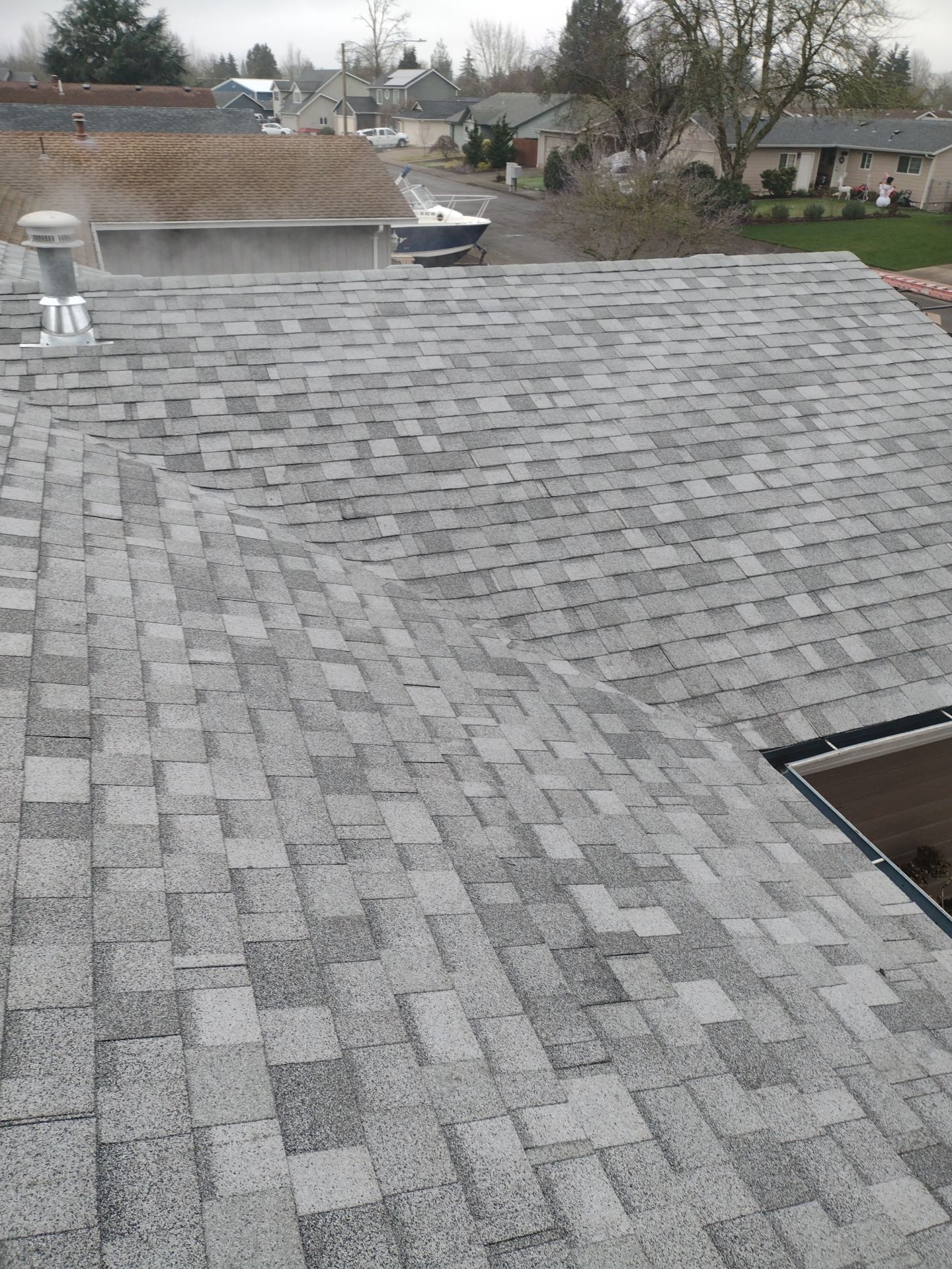 Residential Roofing Installation using IKO Dynasty (Color: Frostone Grey) by Orezona Building & Roofing Company, Inc.