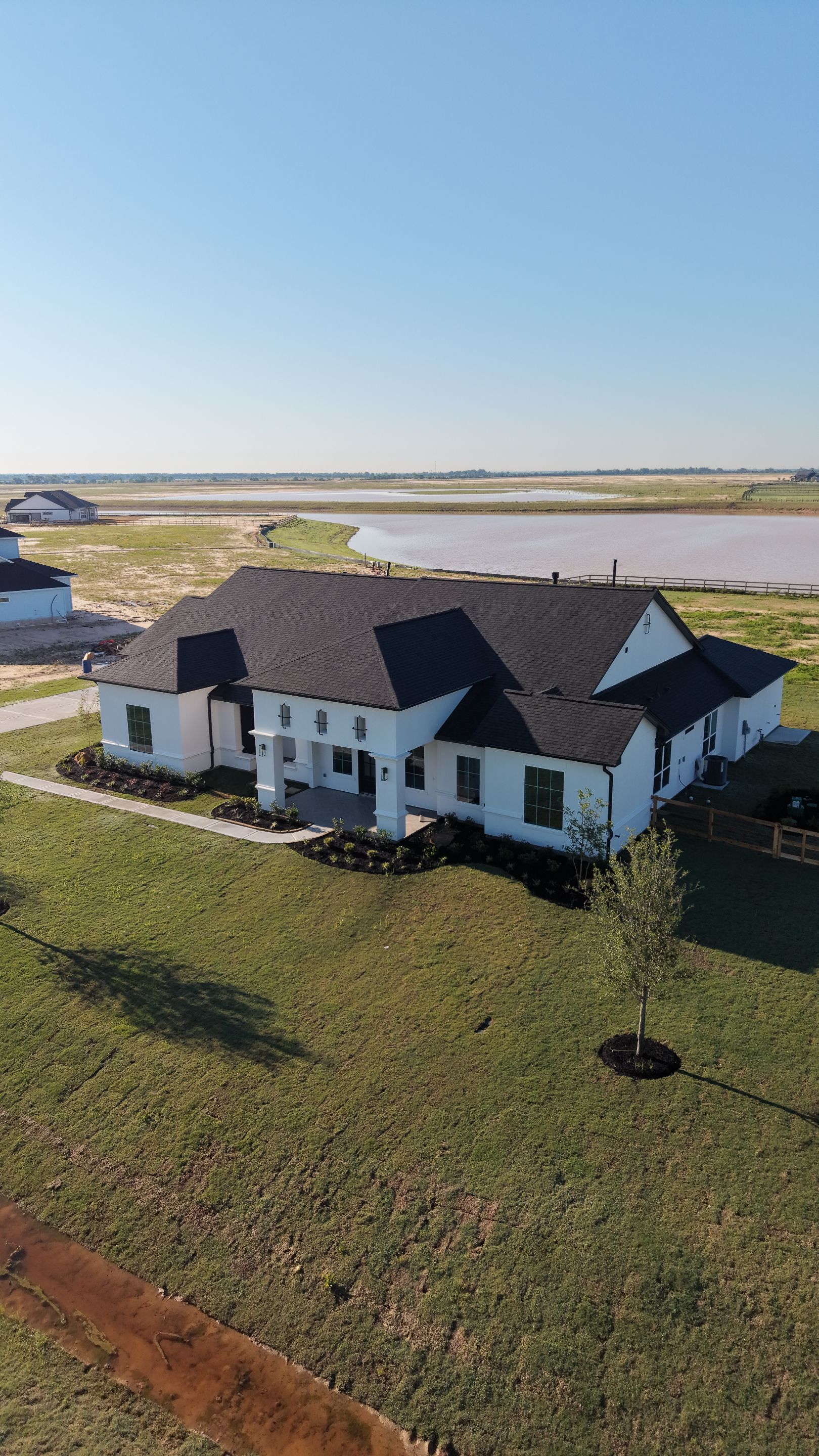 Custom Stucco Masterpiece with Precision Foam Detailing – Waller, TX by Apex Conventional Stucco Llc