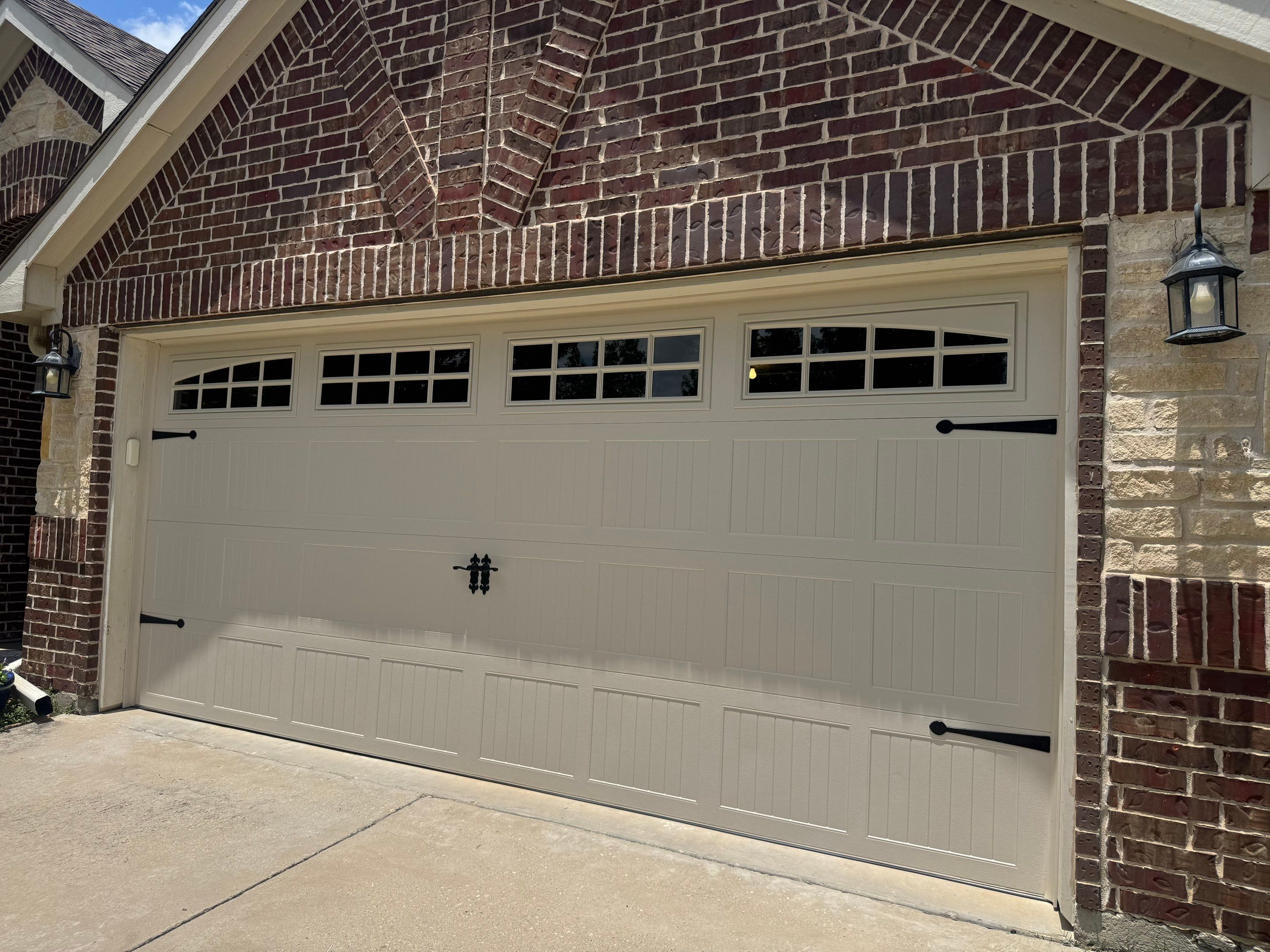 CHI Carriage Stamp Garage Door Installation With Decorative Hardware In Roanoke by Meadows Garage Doors
